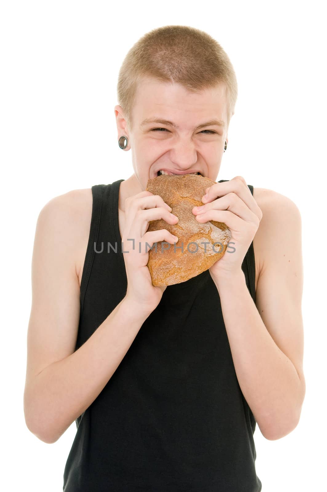 hungry teenager eating bread isolated on white background