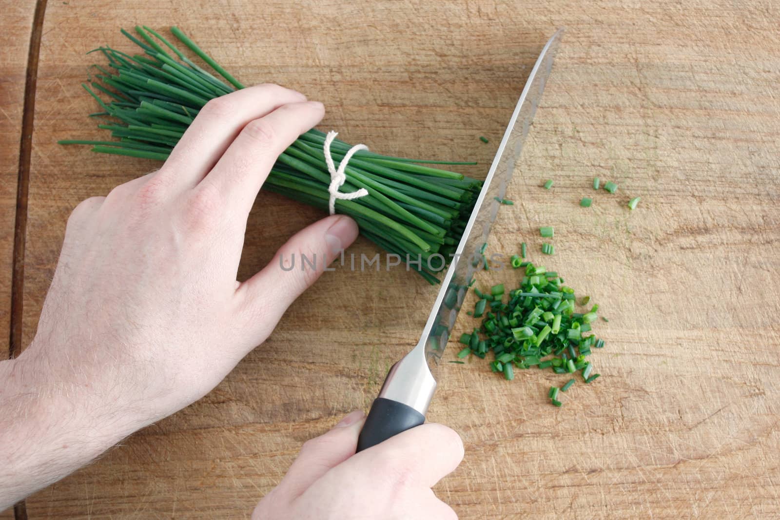 Chives on a wooden surface