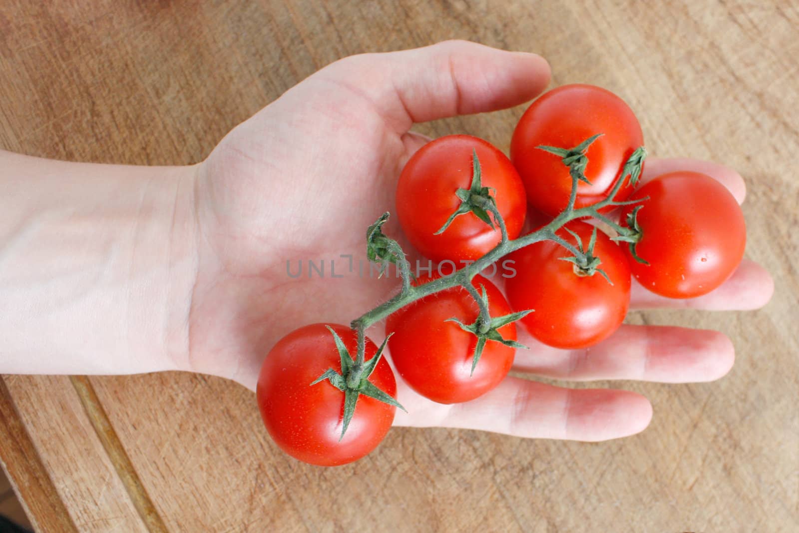 Delicious tomatoes on a chopping board