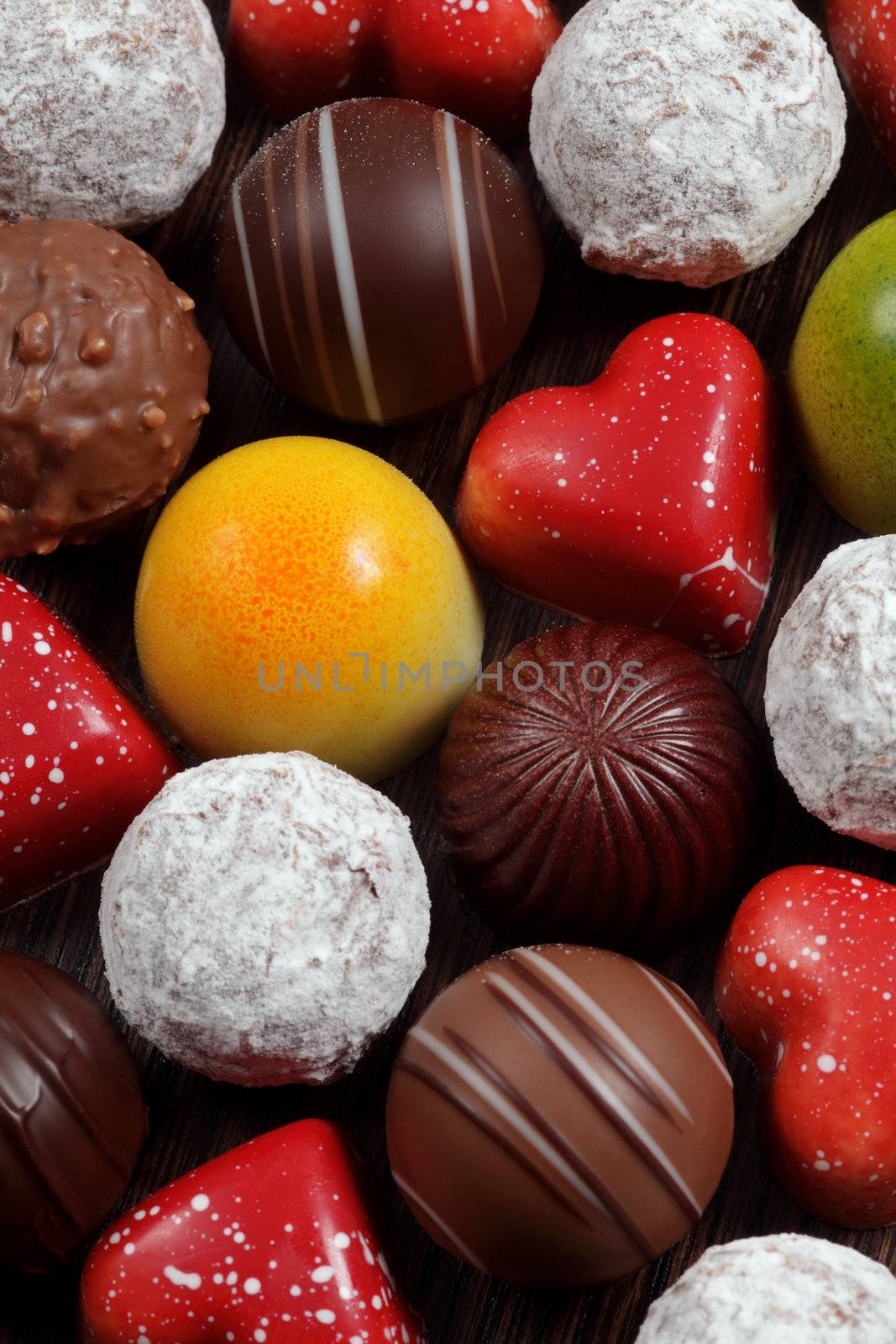 Photo of assorted truffles, pralines, and liqueur filled chocolates.