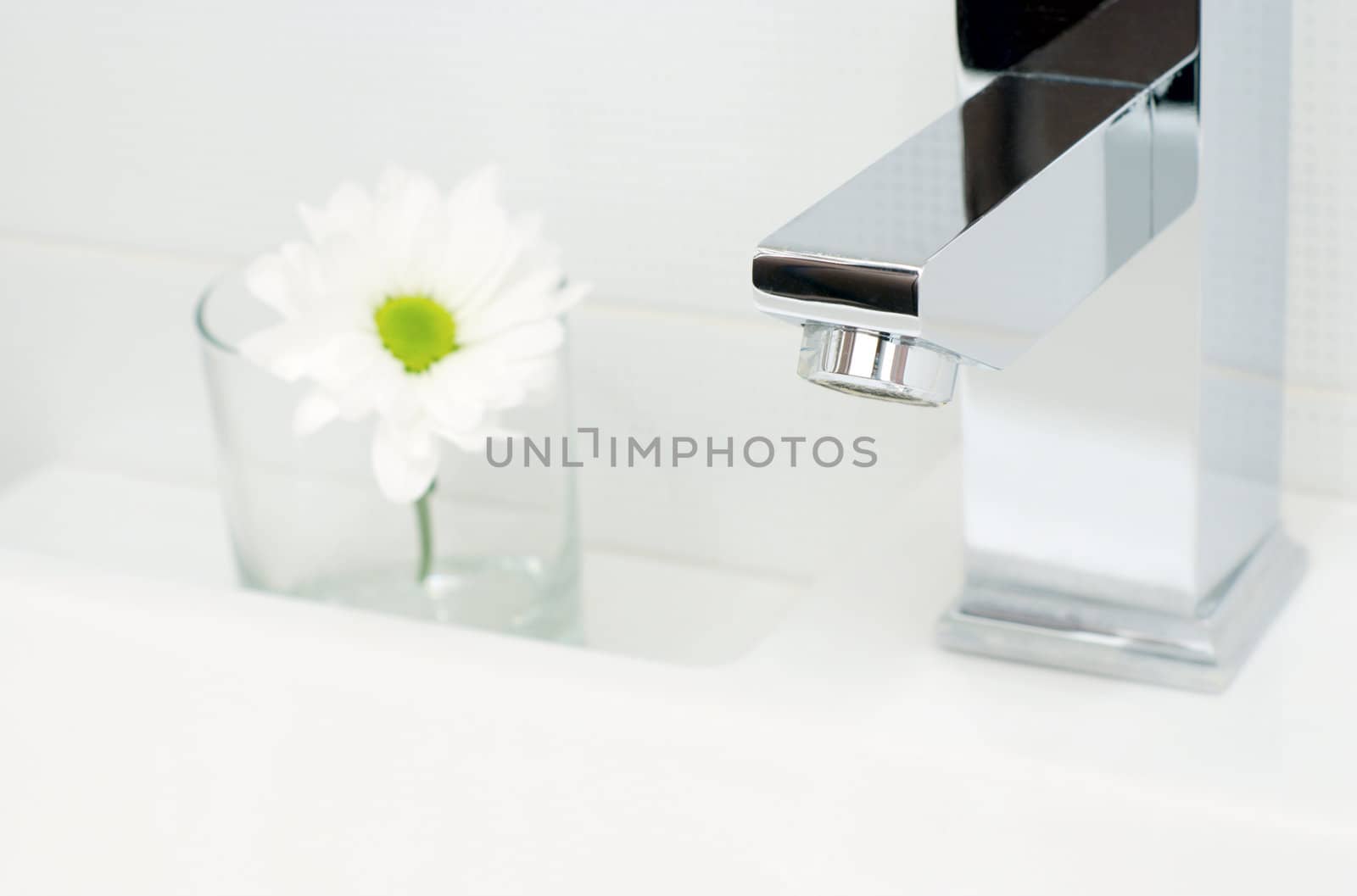 Chrome tap water and flower by kzen