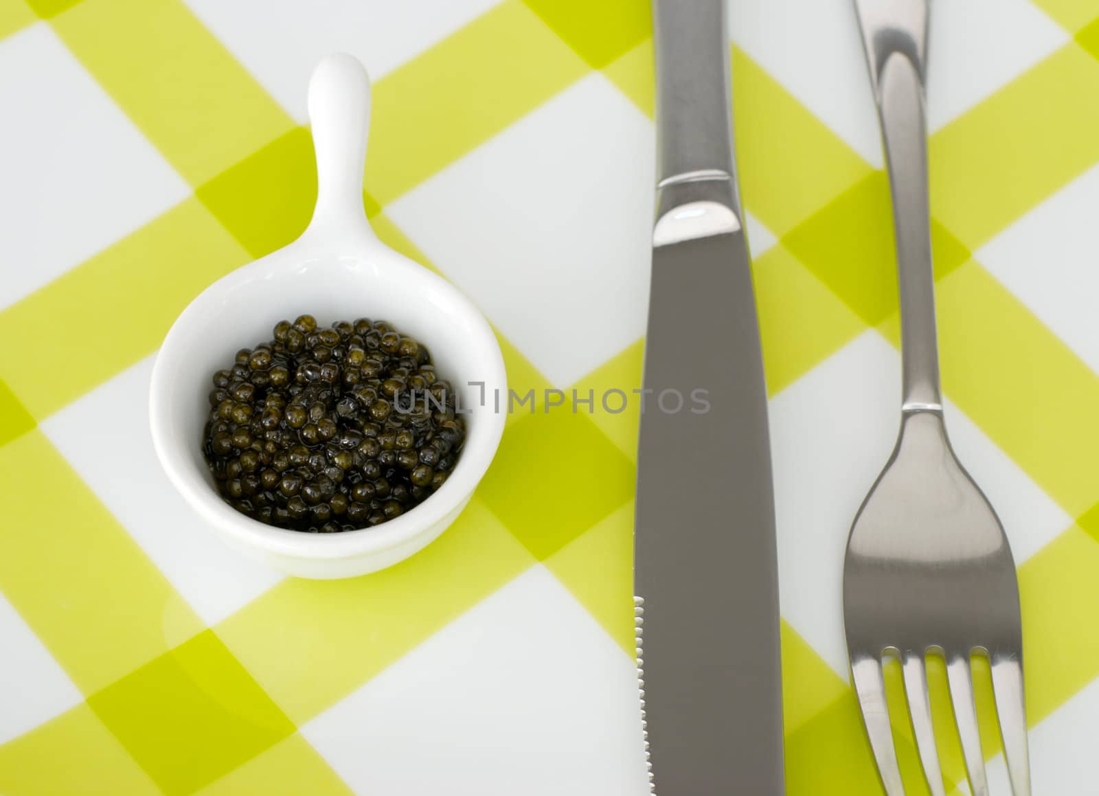 Bon appetit - caviar, fork and knife