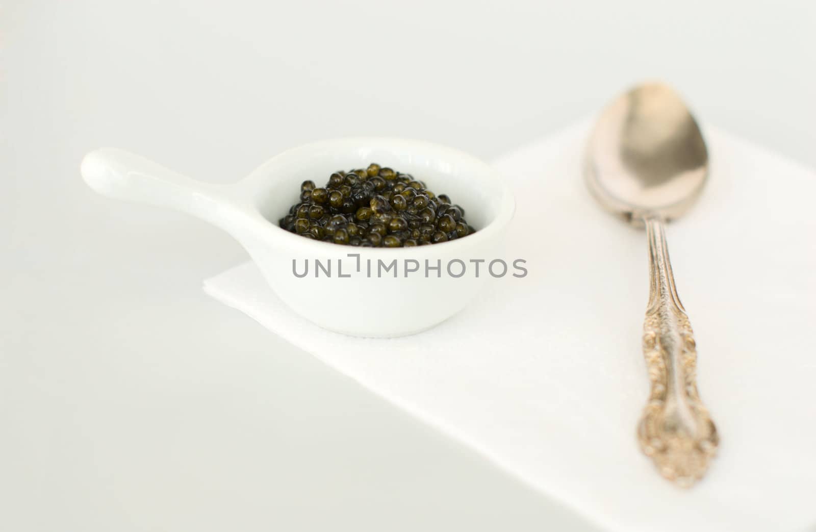 Bon appetit - caviar and silver spoon