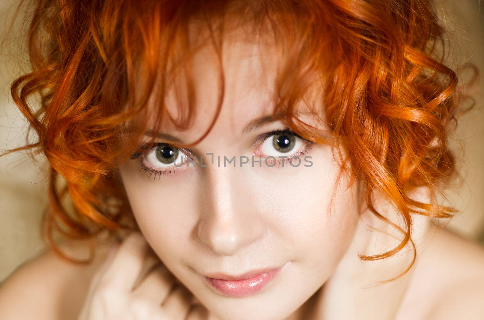 Portrait of a beautiful red girl with shallow depth of field