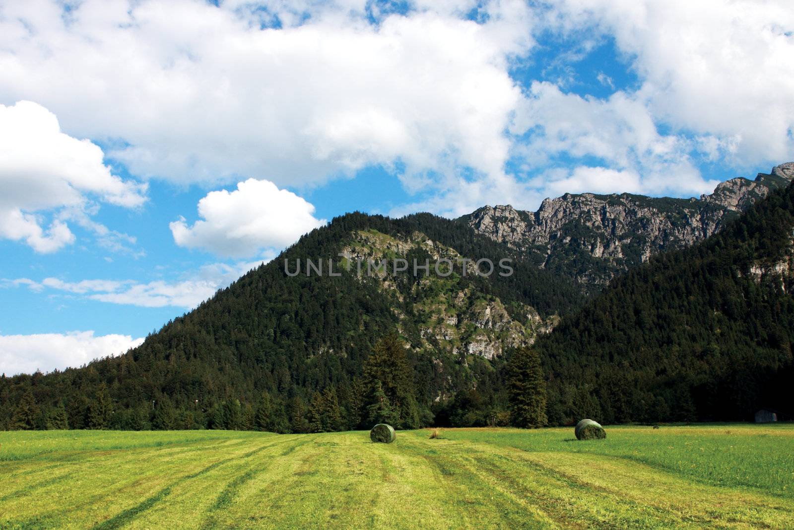 beautiful alpine landscape with sky and mountains