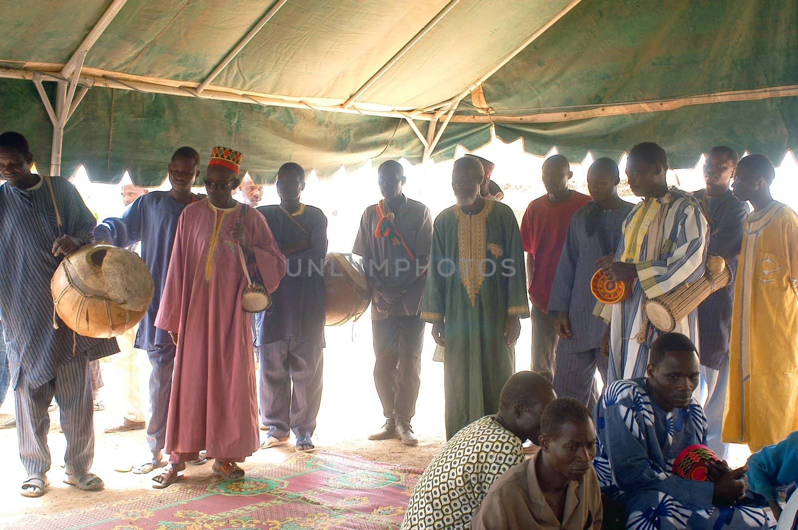 The festival of establishment of a usual chief in Burkina Faso Faso lasts three days. The usual chief succeeds his father deceased, it is always the groin of the family and always a man. It is a very rare event because a chief can be replaced only after his death. During establishment it is the festival and all the area is invited. This festival occurs to Kokemnour�, small village in the East of Burkina Faso Faso in the province of Kouritanga. These three days are punctuated of dance, meal and especially of traditional ceremonies African. The Chief is the King and can be established only by chiefs more important than him.                                