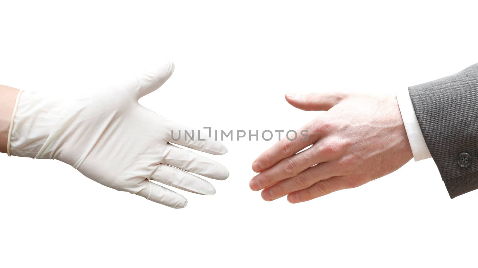 A doctor shaking hands with a business man