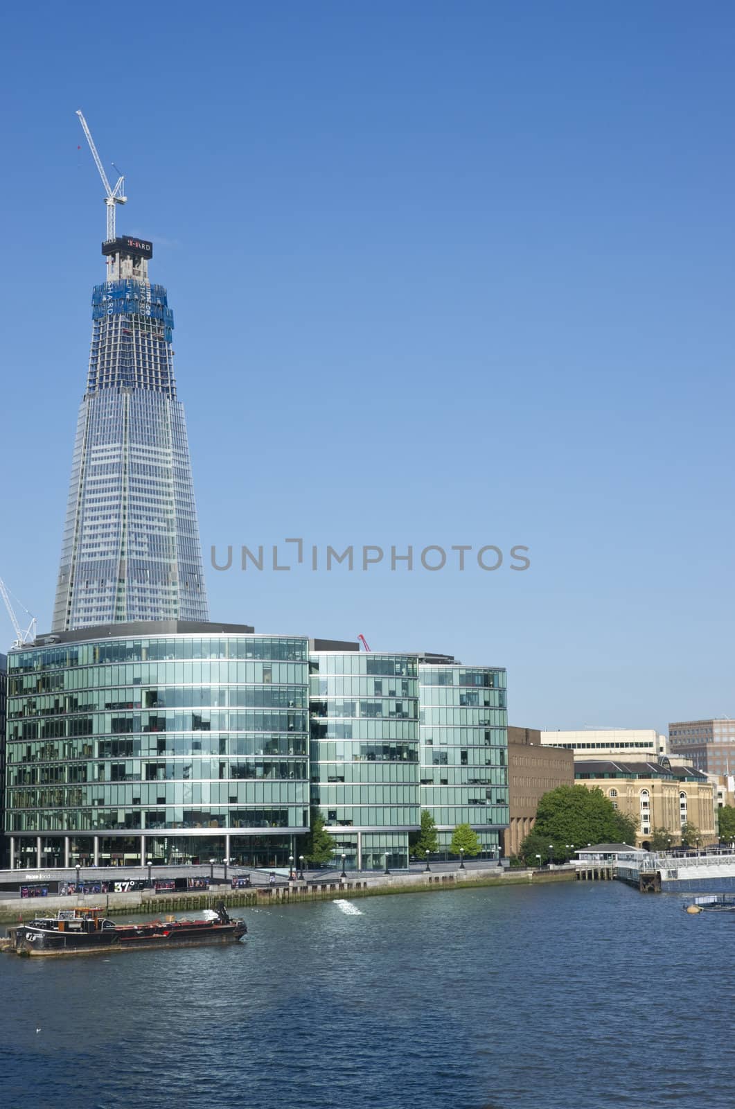 The Shard under construction at London Bridge on the River Thames in London, England. When complete it will be the tallest building in the European Union.