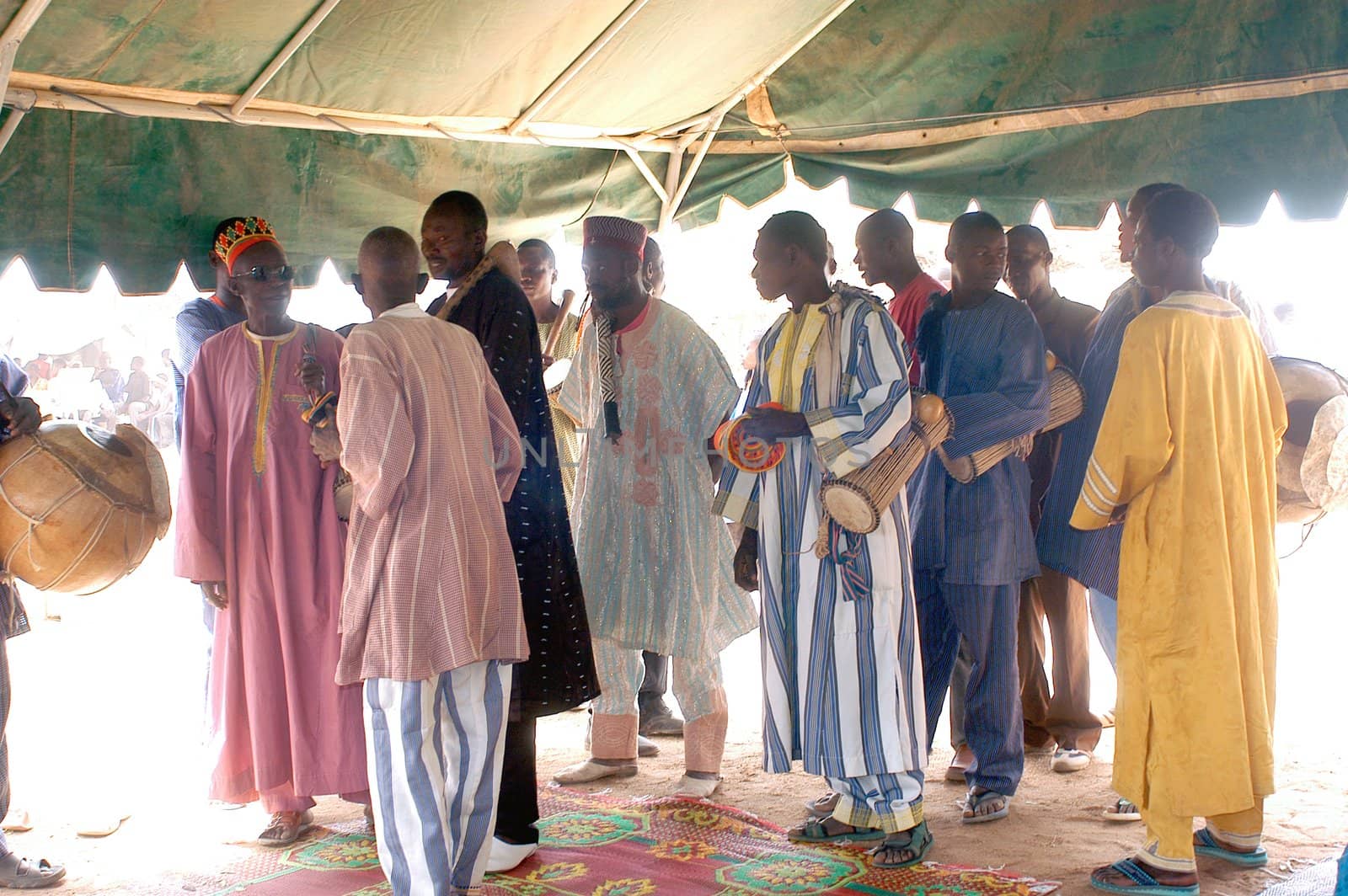 The festival of establishment of a usual chief in Burkina Faso Faso lasts three days. The usual chief succeeds his father deceased, it is always the groin of the family and always a man. It is a very rare event because a chief can be replaced only after his death. During establishment it is the festival and all the area is invited. This festival occurs to Kokemnour�, small village in the East of Burkina Faso Faso in the province of Kouritanga. These three days are punctuated of dance, meal and especially of traditional ceremonies African. The Chief is the King and can be established only by chiefs more important than him.                                