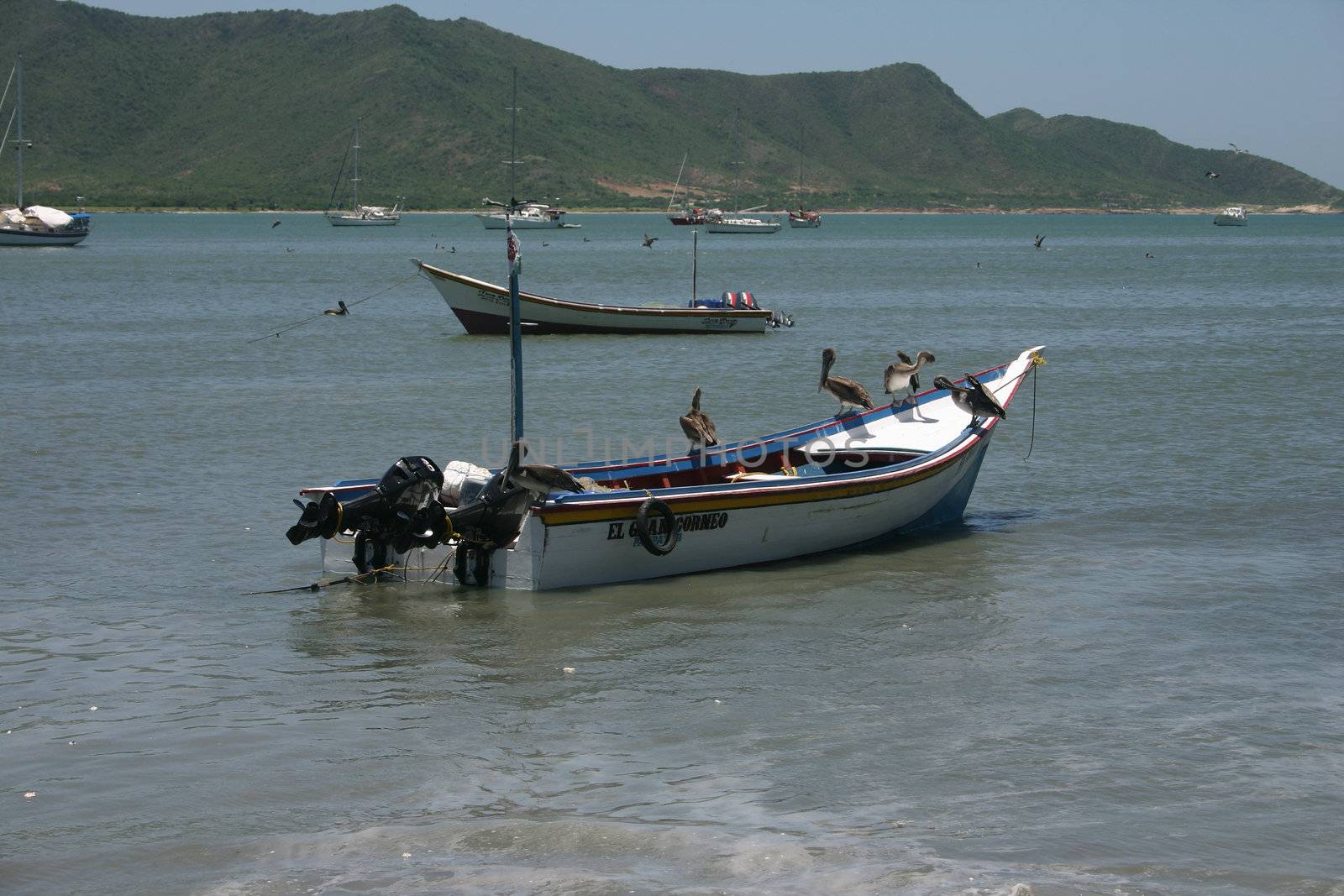 Boats in front of Isla de Margarita by tdietrich