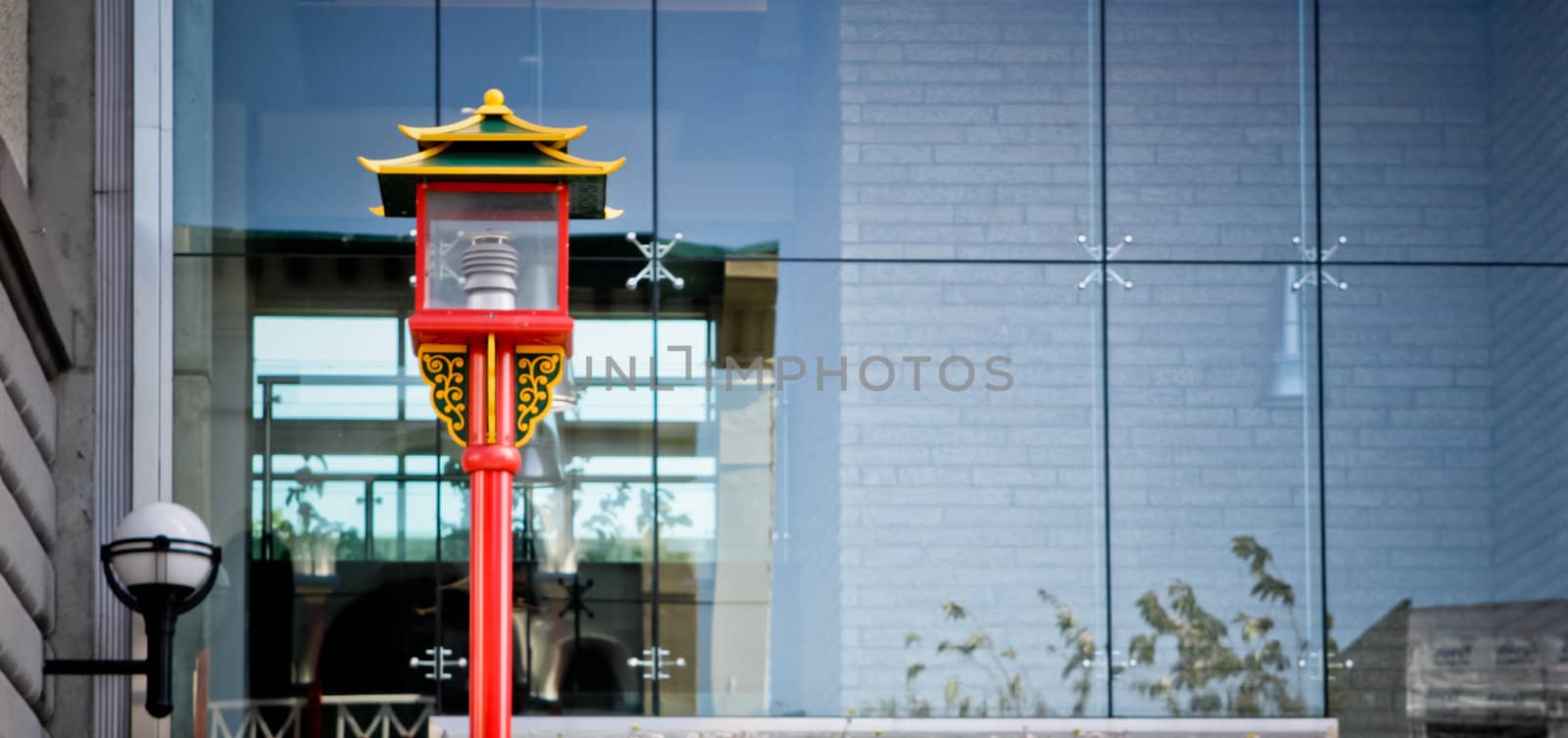 chinese street light i front of modern building