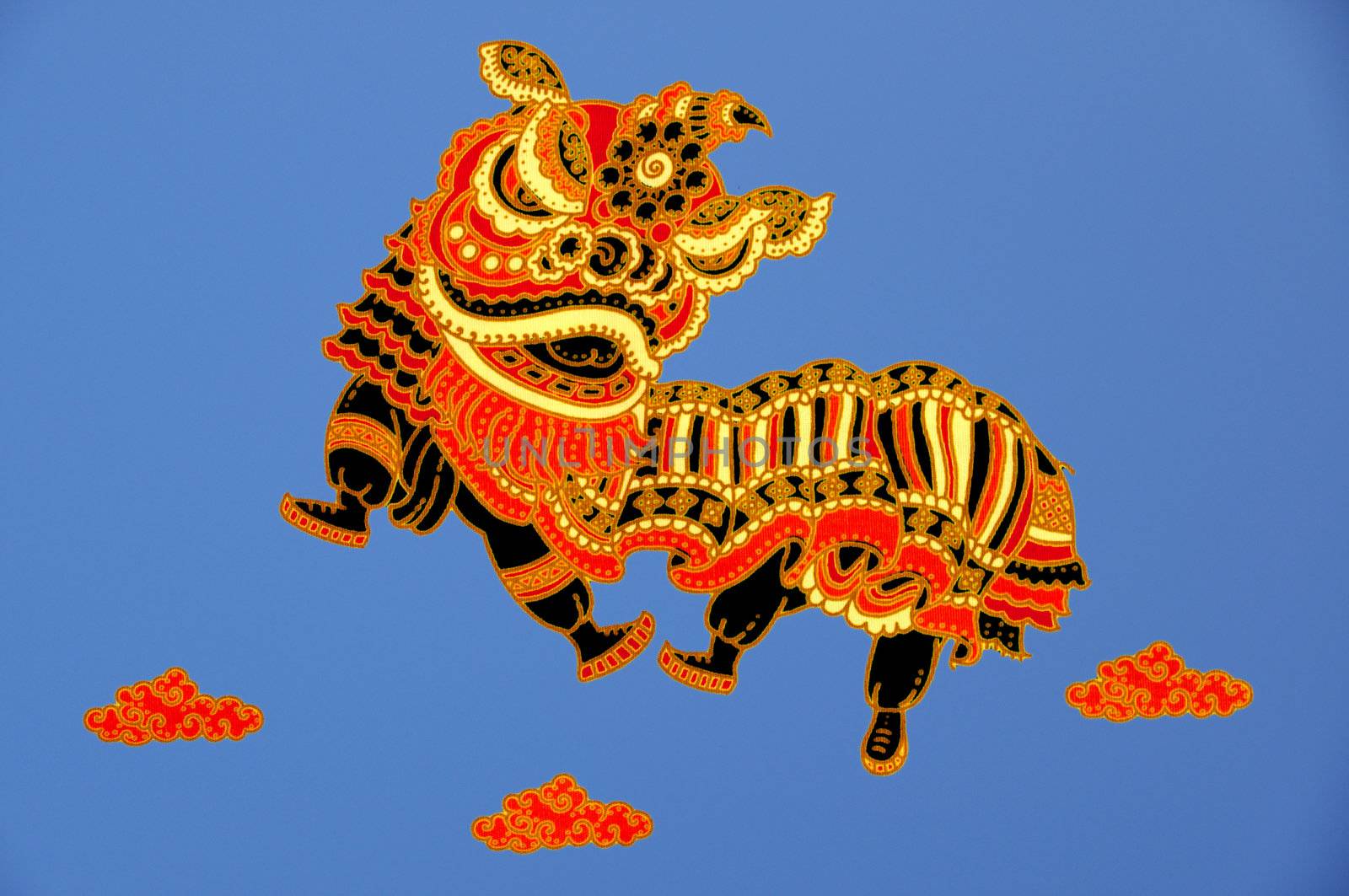 Lion Dancing on Isolated blue sky