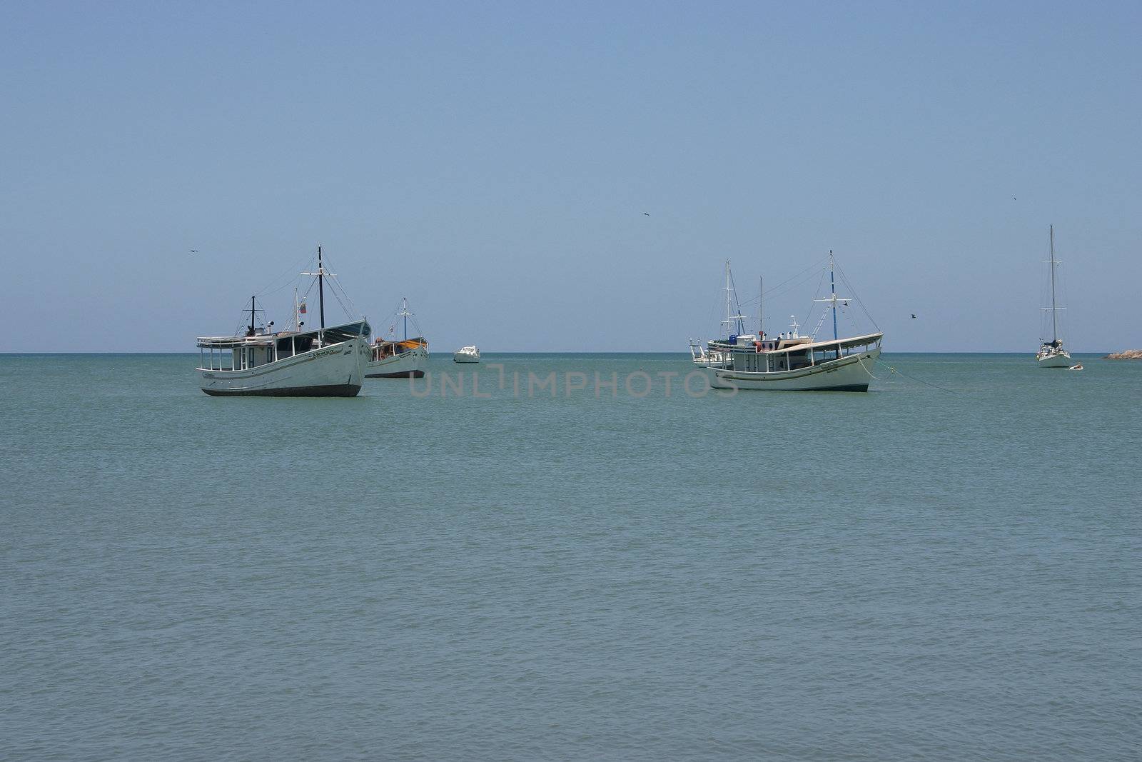 Boats in front of Isla de Margarita by tdietrich