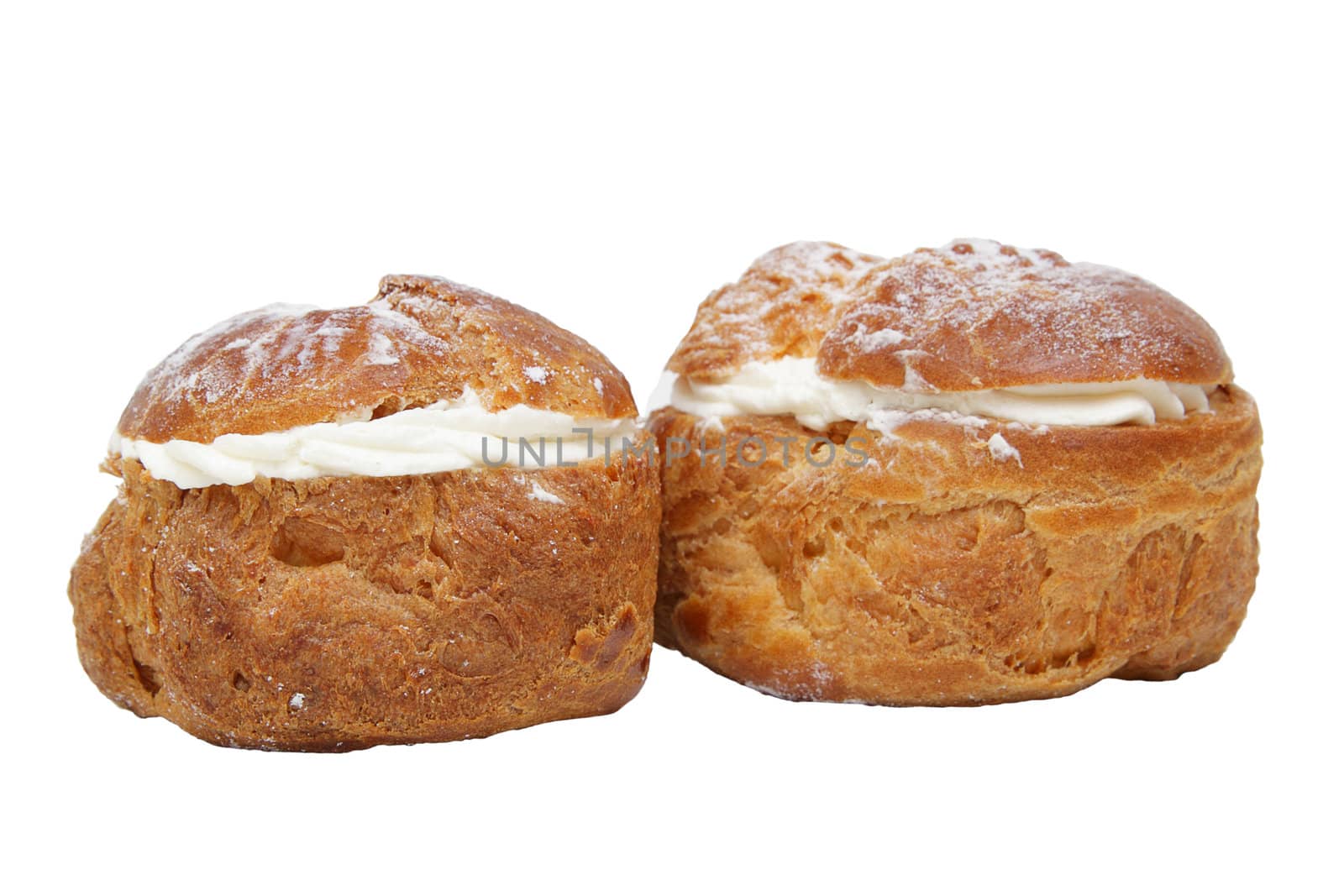 Two profitroles isolated on the white background