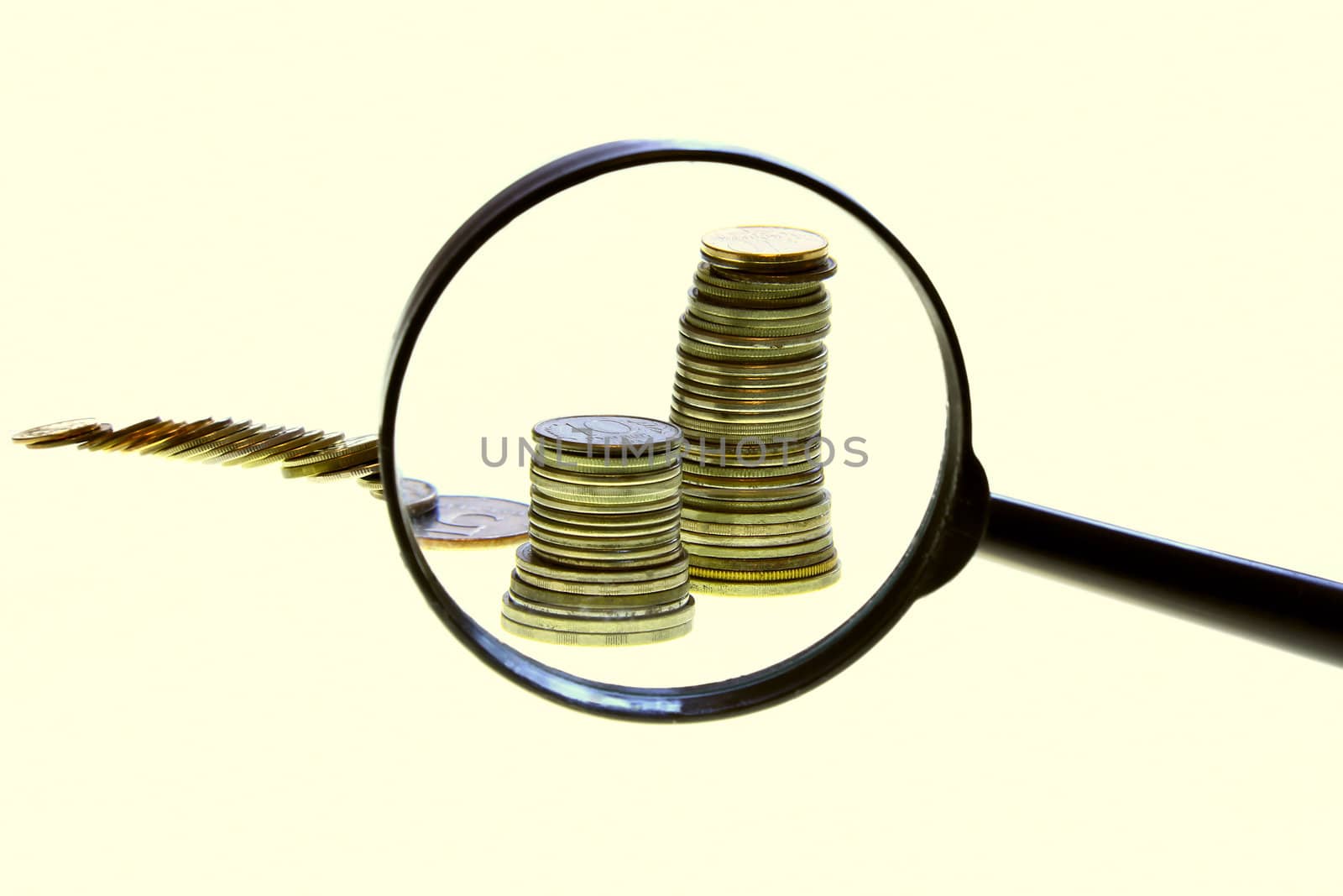 sets of coins on the white background