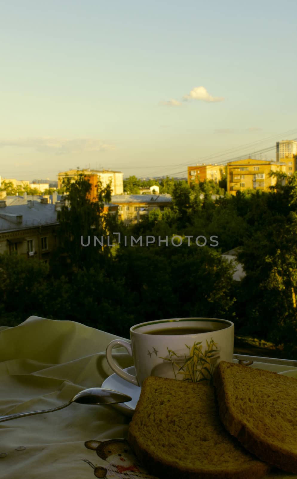 a cup of tea on the window