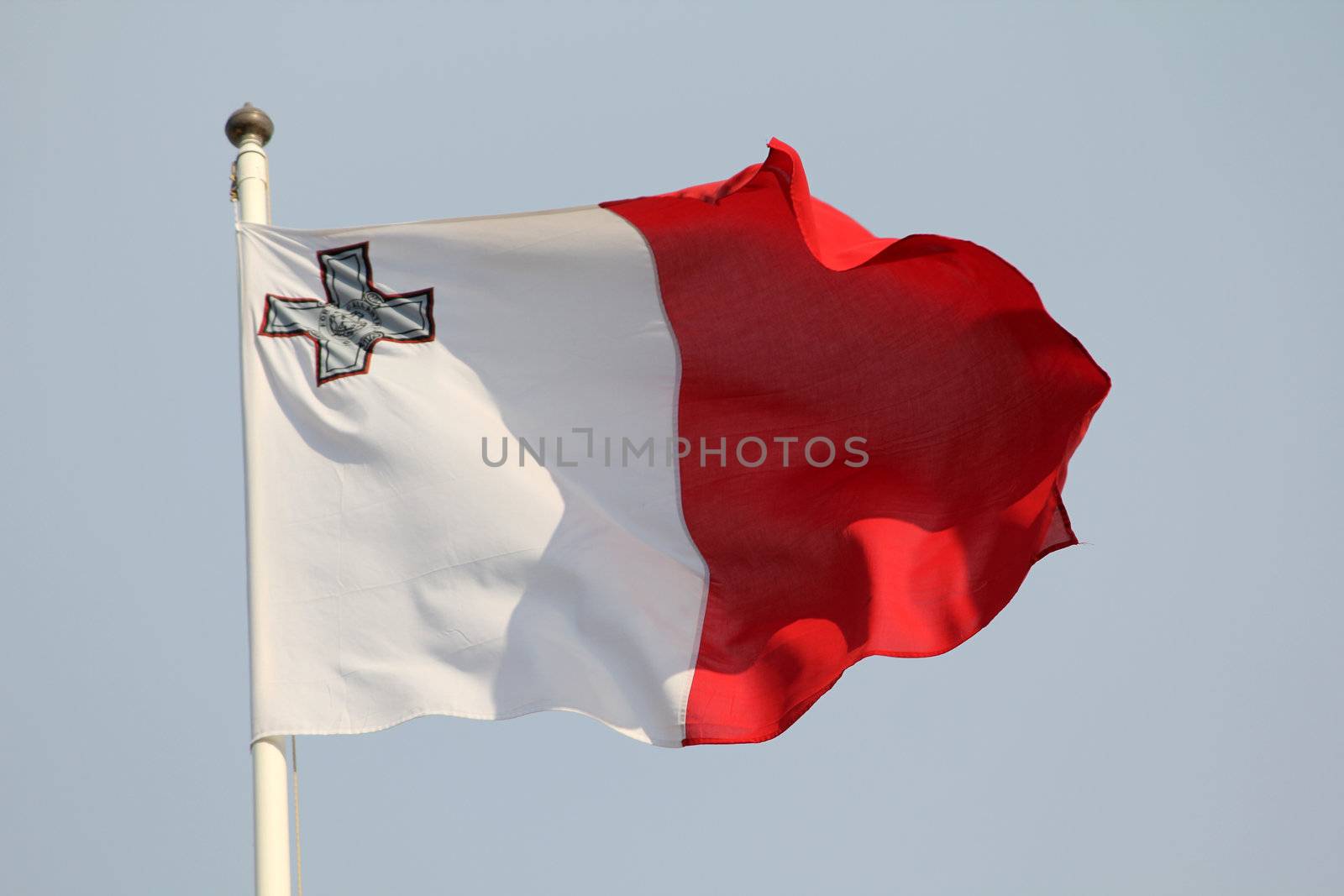 Maltese flag blowing in the wind 