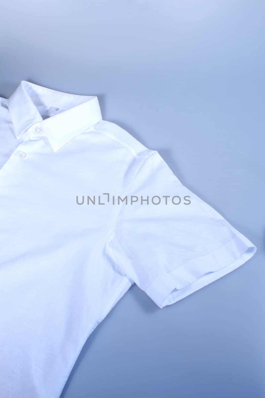 a white shirt  on the grey background
