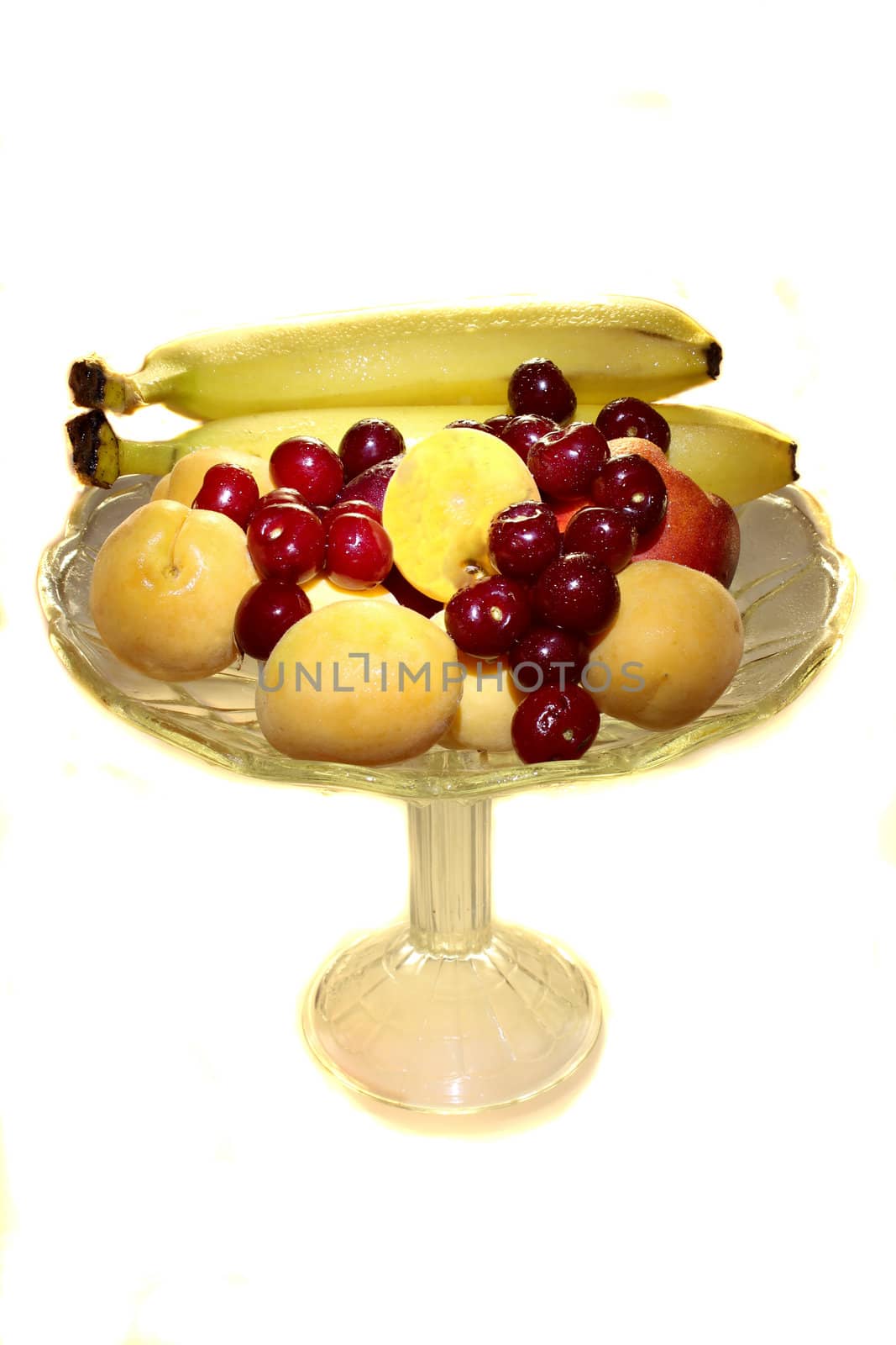 ripe fruits on the cristal plate