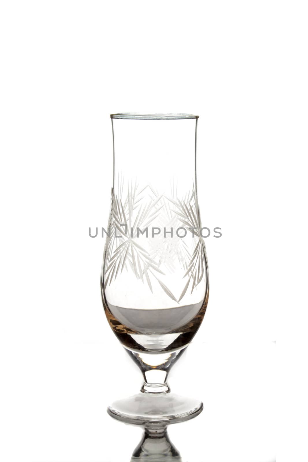 a cristal goblet on the white backgound