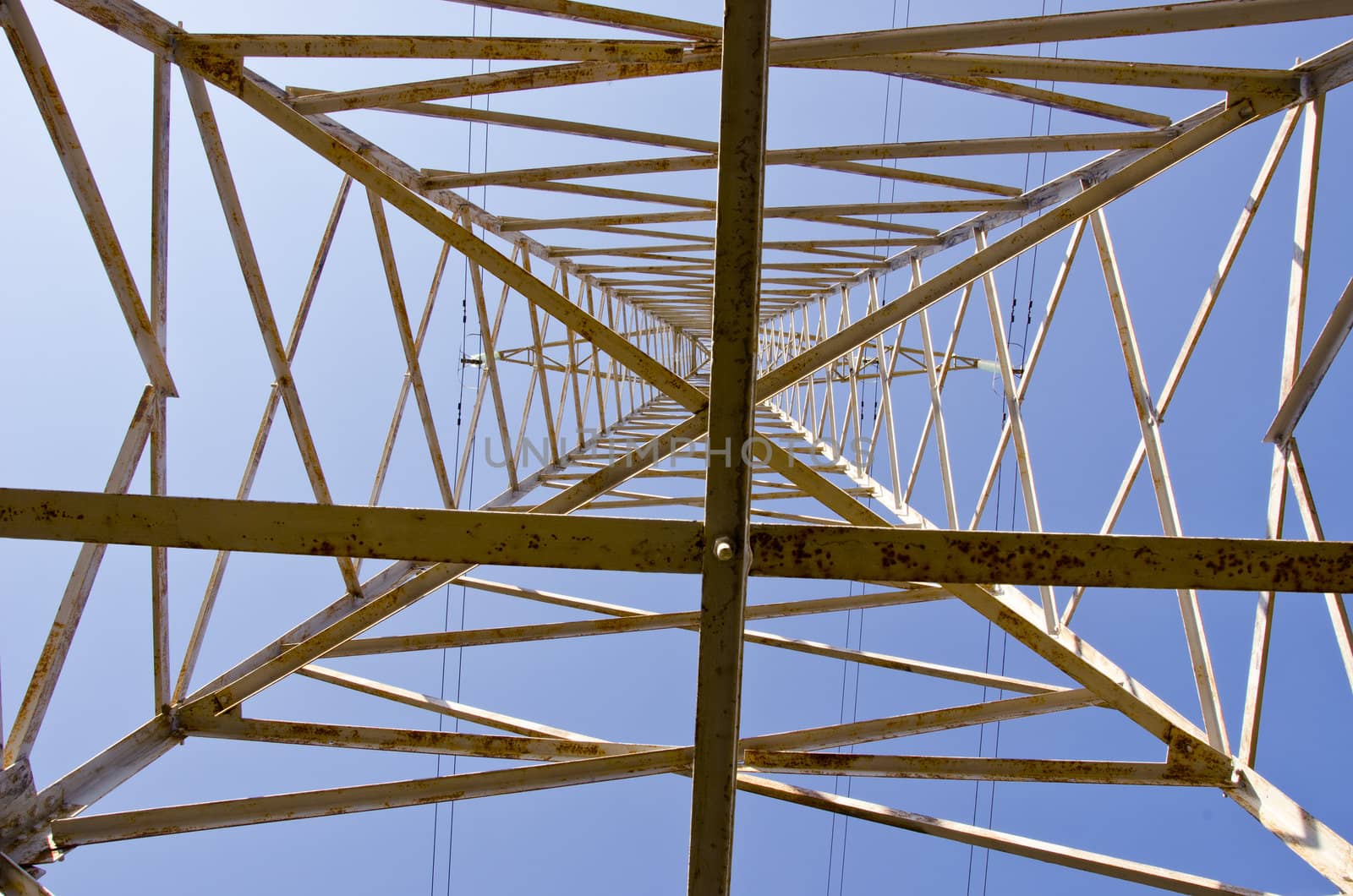 Closeup of electricity pole. by sauletas