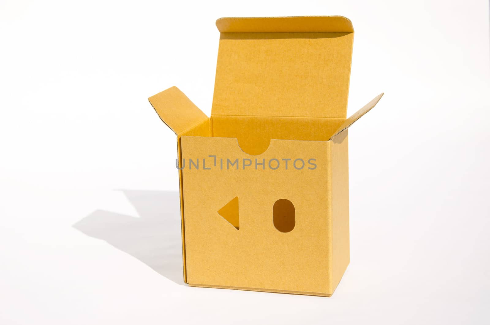 Opened paper packing box on a white background with shadow.