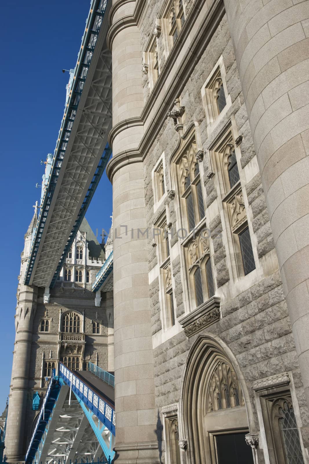 Tower Bridge over the River Thames in London, England. The bascules over which the road normally passes are open to allow ships and boats to pass.