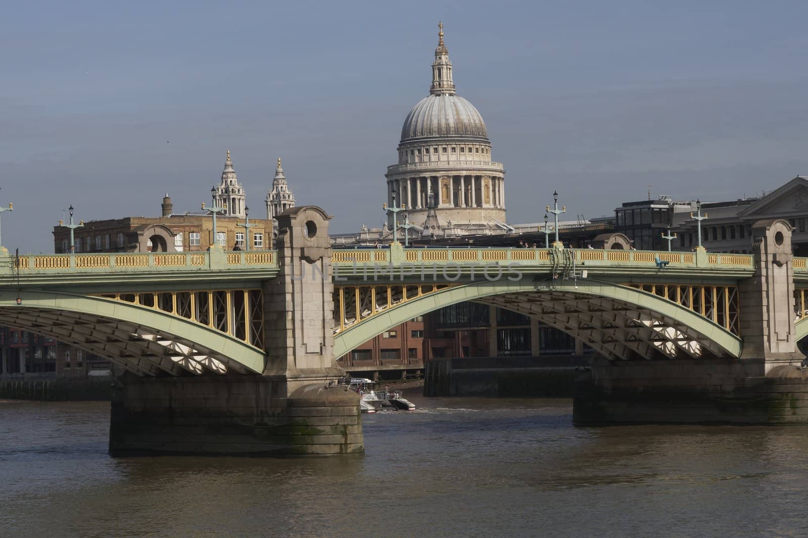 Dome of St Pauls Cathedral Southwark Bridge over the River Thames in London, England