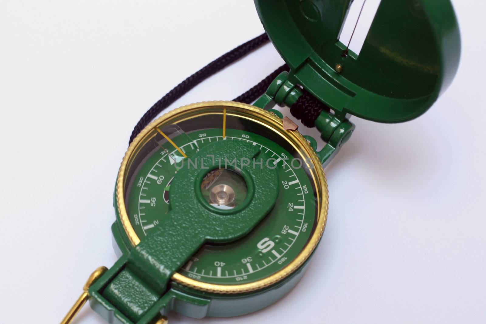 a green open engineer's directional compass