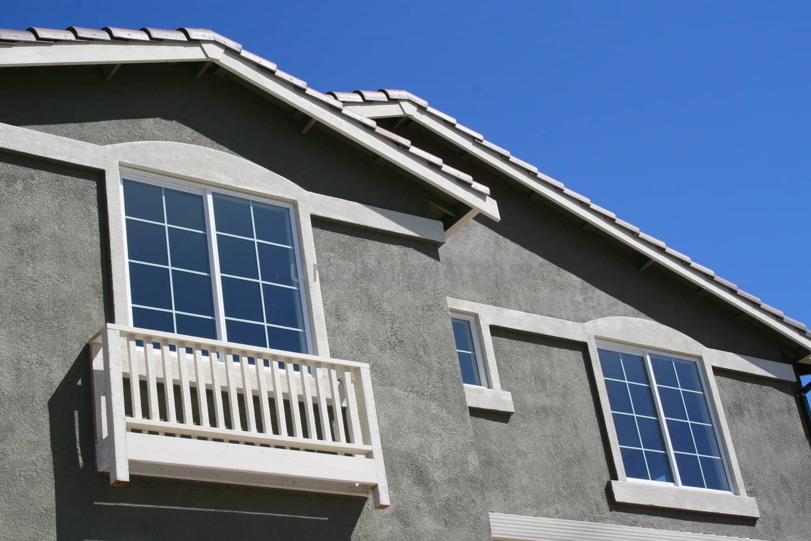 Close up of the windows of a house.
