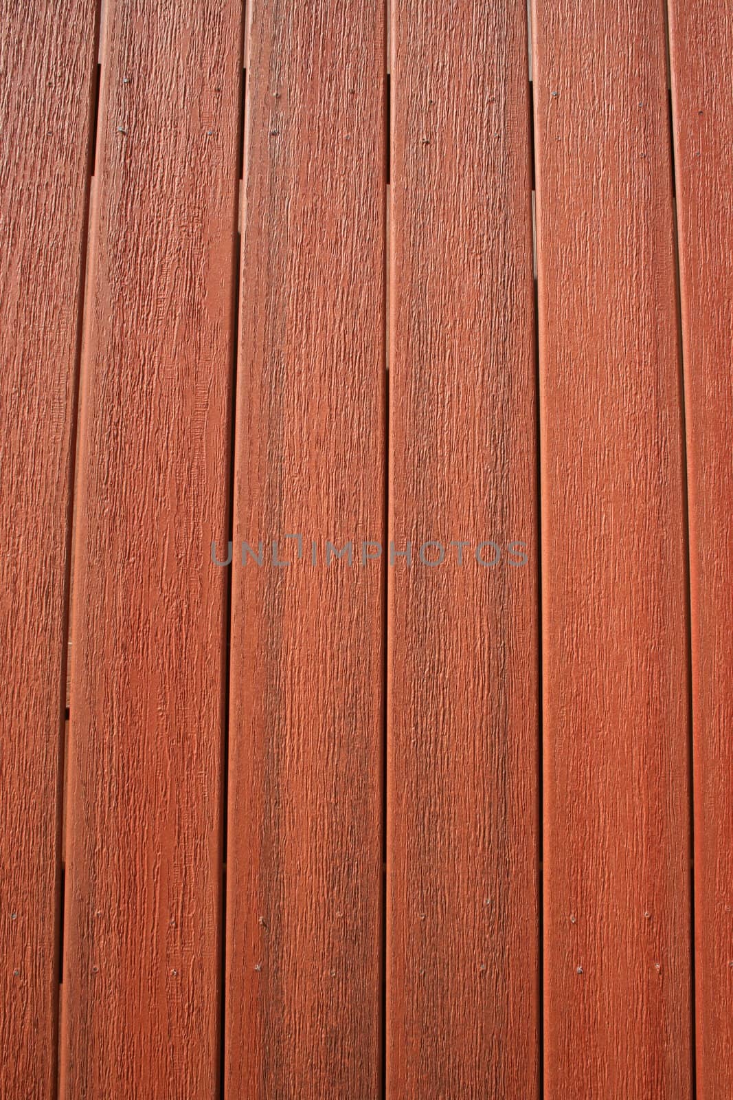 Close up of a wooden wall showing unique pattern.
