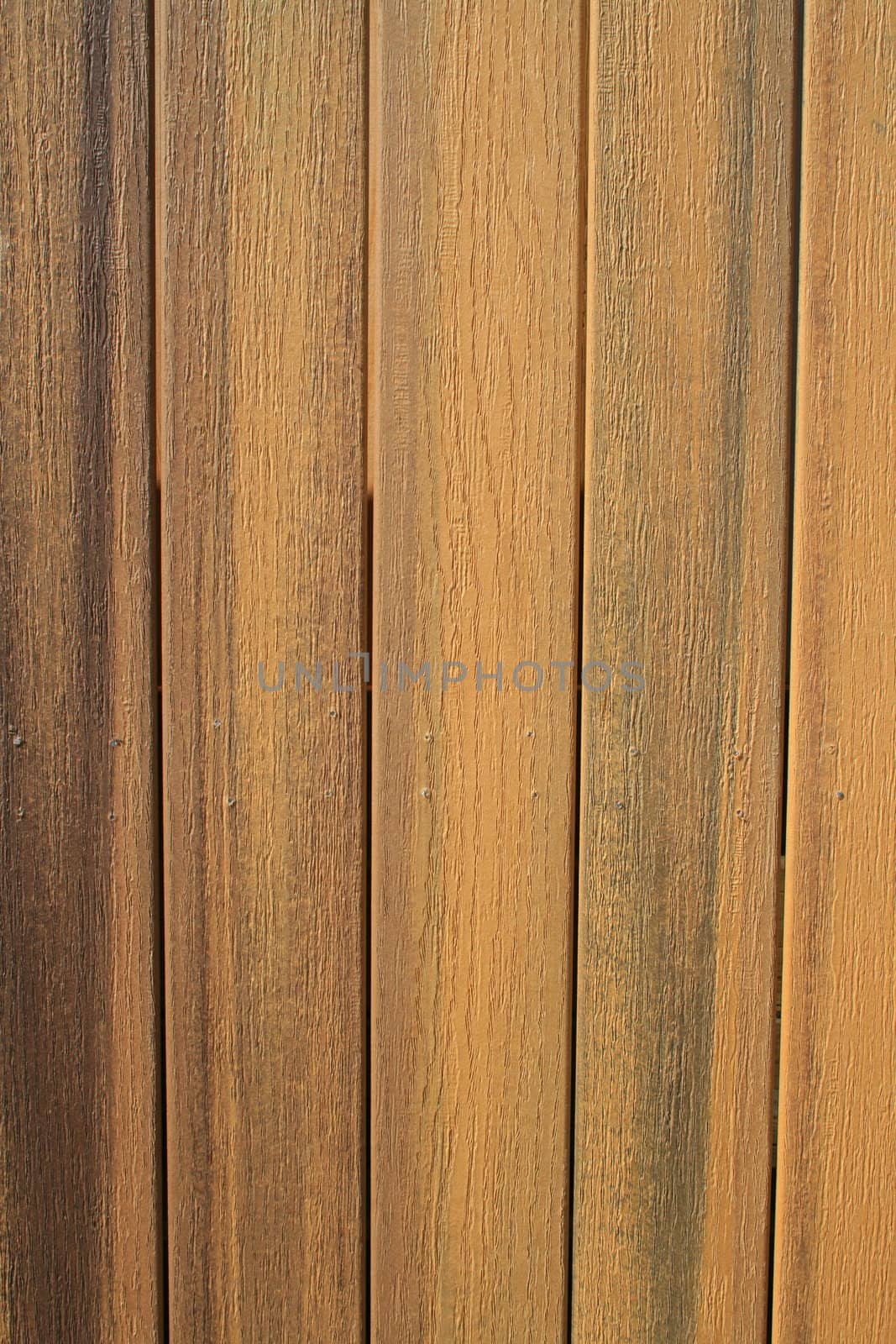 Close up of a wooden wall showing unique pattern.
