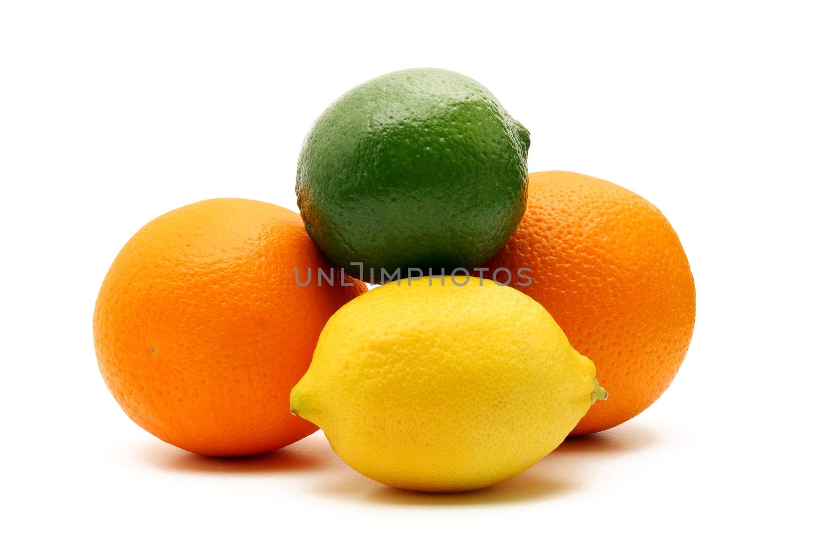 Oranges, lemon and lime isolated on white background