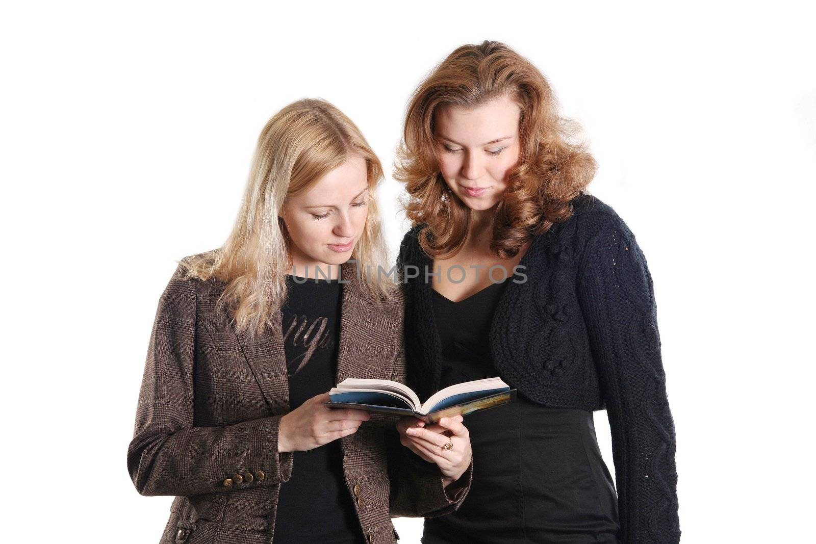 studying teaching learning two women reading book 