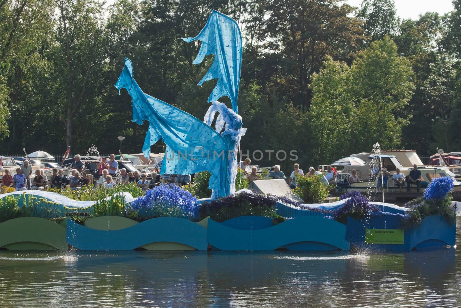 VLAARDINGEN  AUGUST 05: Each year this unique floating parade of beautiful decorated boats sail through the Westland. Theme this year: Theatre on water, August 05, 2011, Vlaardingen, the Netherlands

