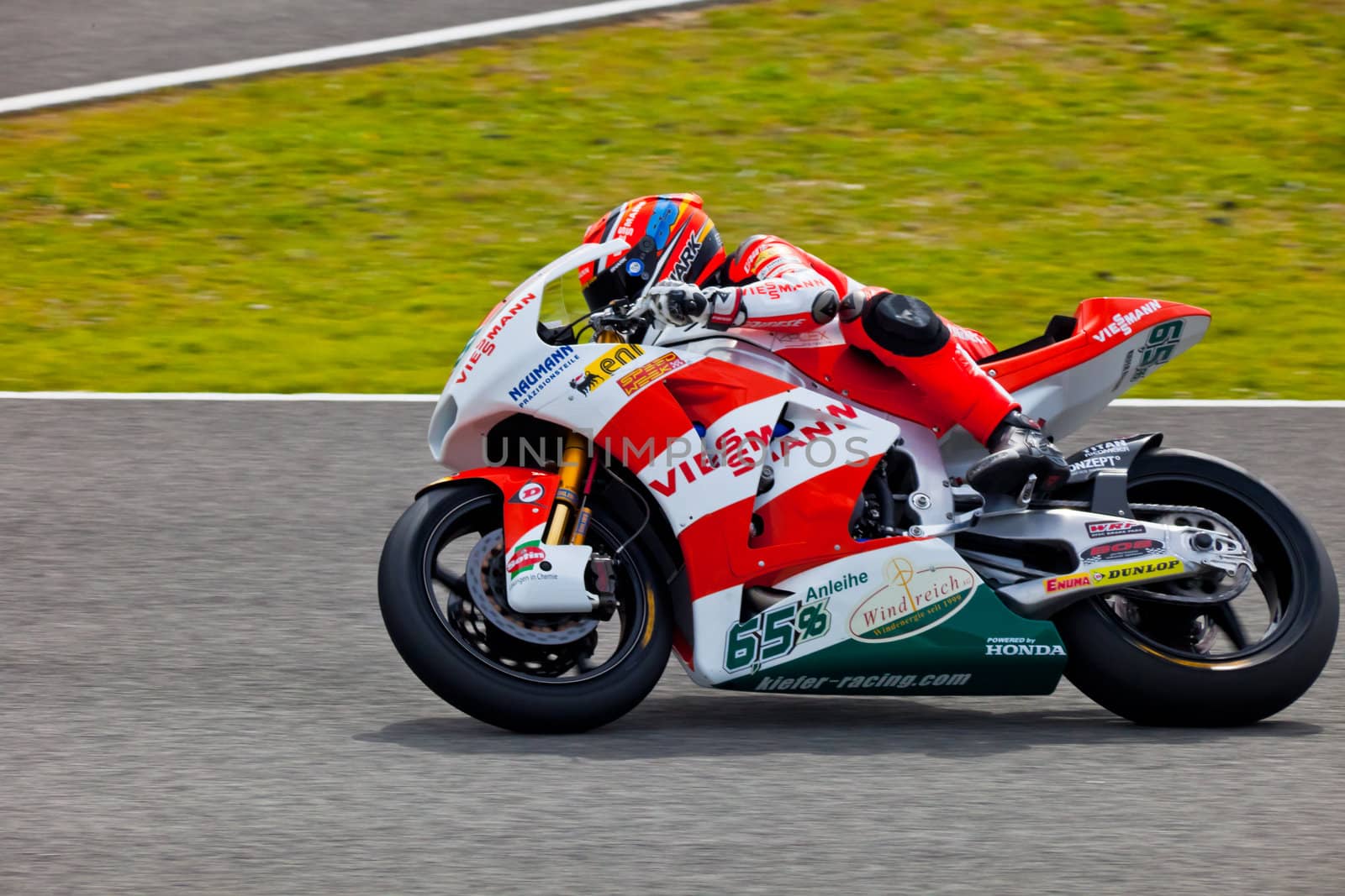 JEREZ DE LA FRONTERA, SPAIN - MAR 5: Moto2 pilot Stefan Bradl races on the official training of the world championship of MotoGP on Mar 5, 2011, in Jerez de la Frontera, Spain