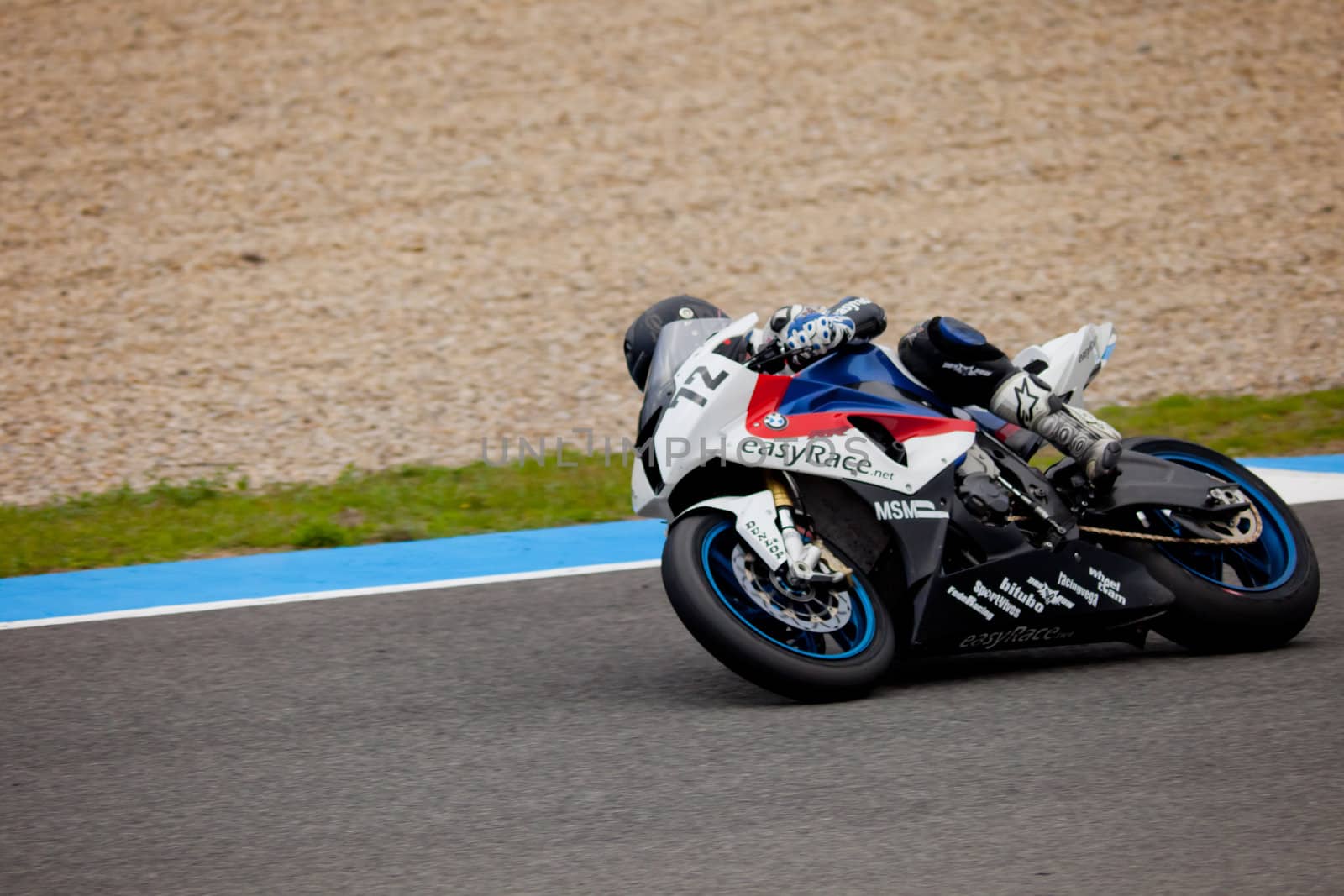 JEREZ DE LA FRONTERA, SPAIN - NOV 20: Stock Extreme motorcyclist Javier Pascual takes a curve in the CEV championship on Nov 20, 2010, in Jerez de la Frontera, Spain