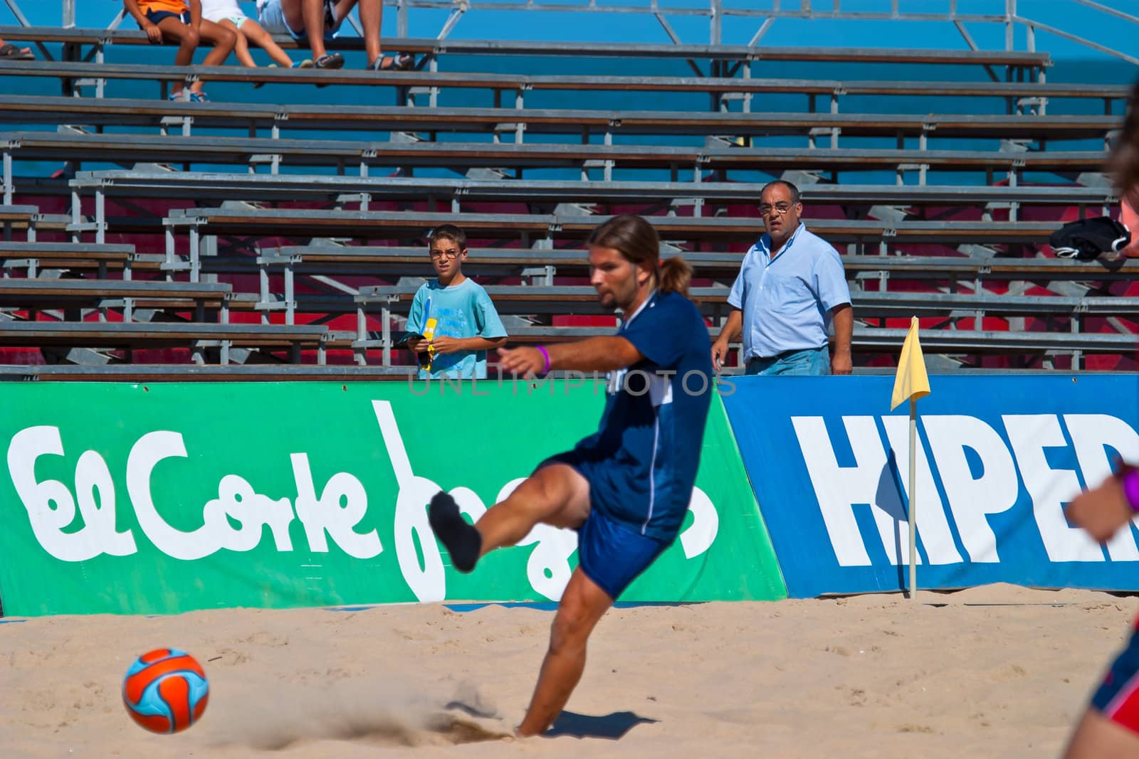CADIZ, SPAIN -  JUL 30:  Unknown player of the team of Cadiz playing the Spanish Championship of Beach Soccer on Jul 30, 2005 on the beach of La Victoria in Cadiz, Spain