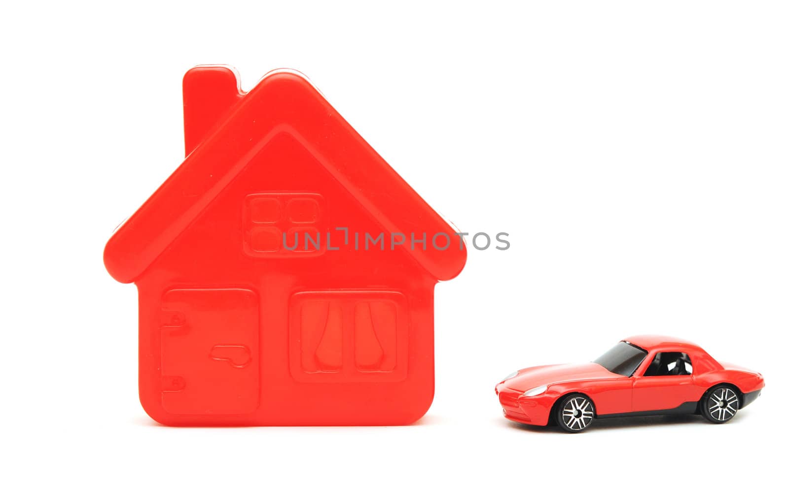 a house and car toy isolated on white