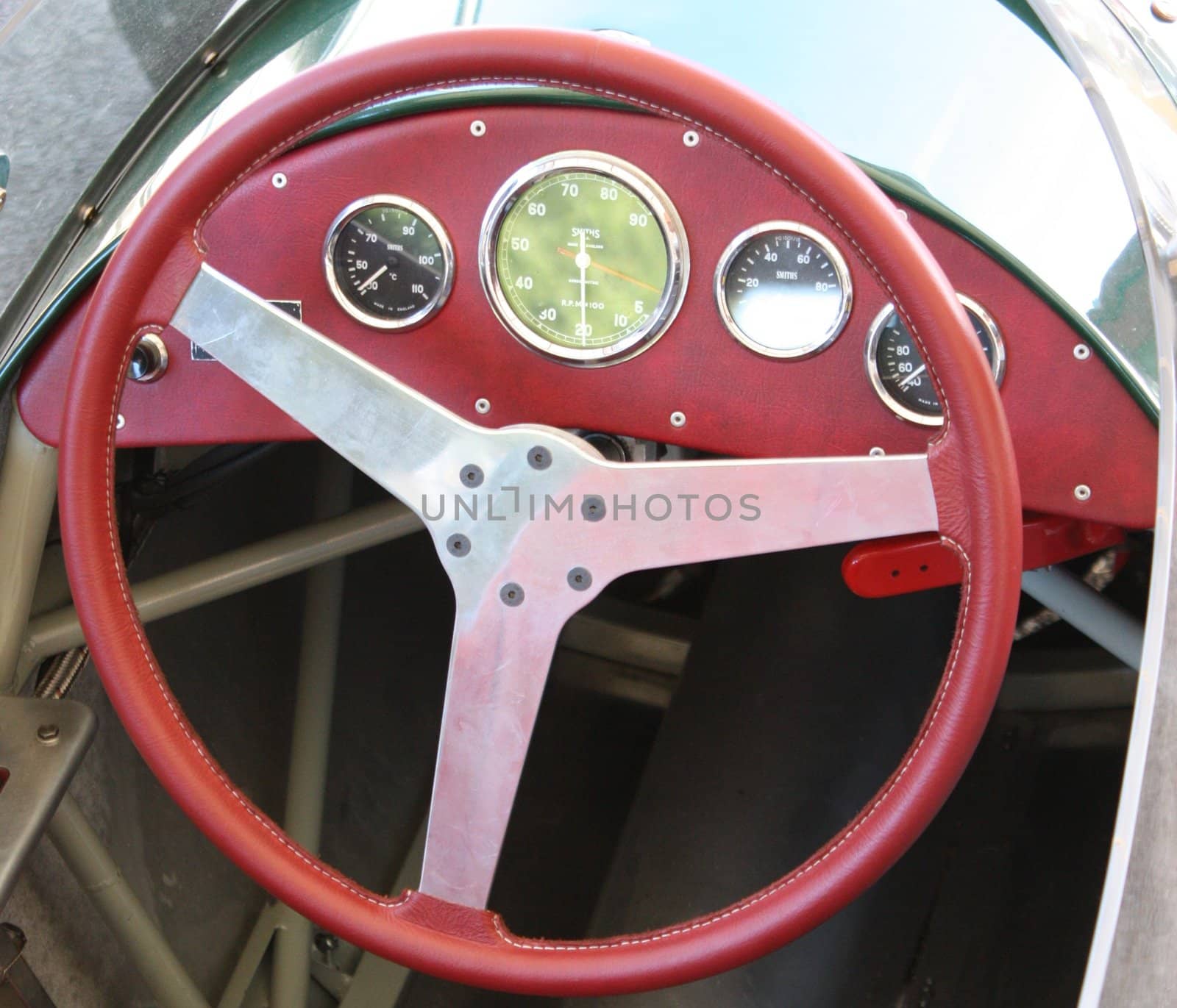 Classic car steering wheel and dashboard