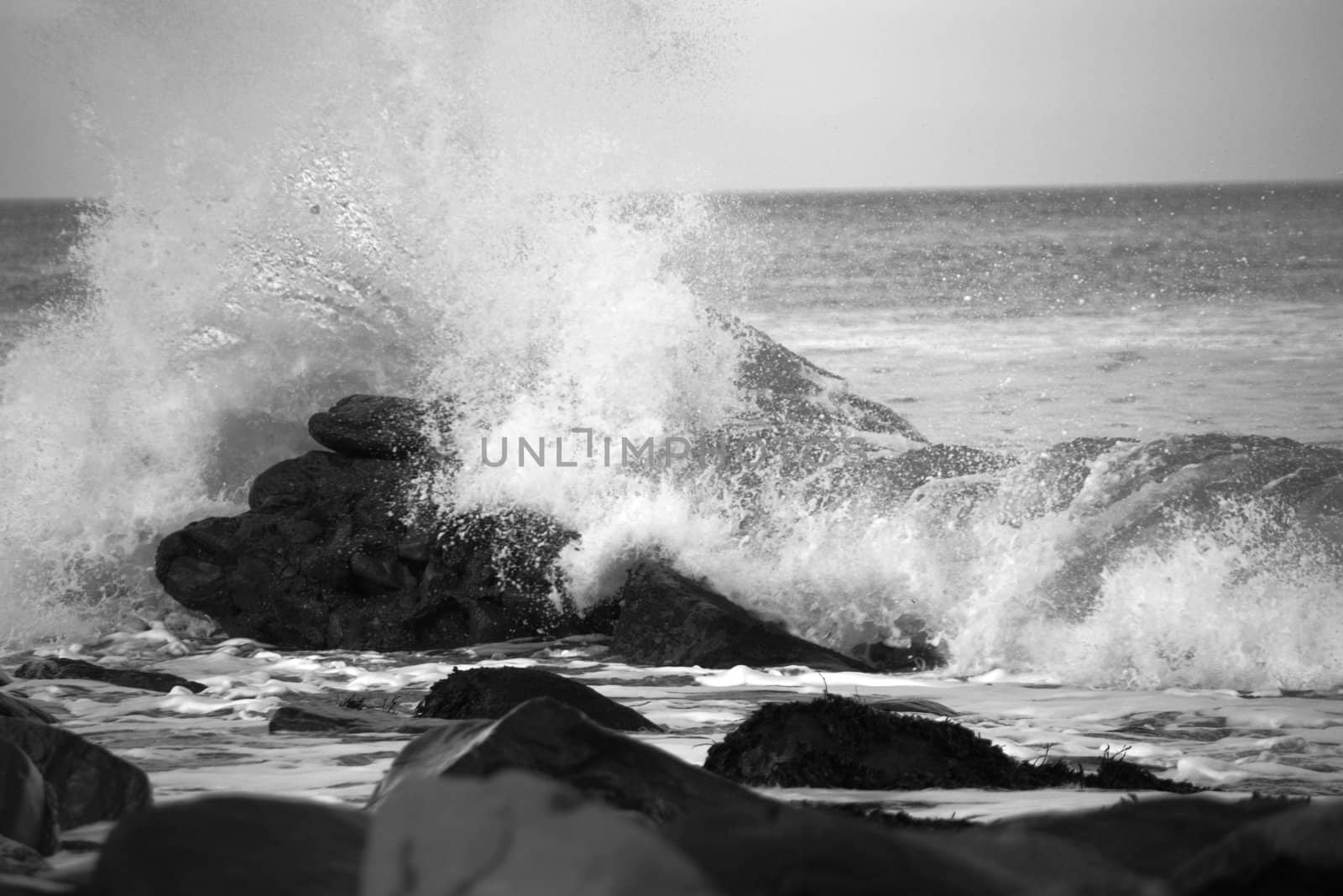 Wave breaking over rocks