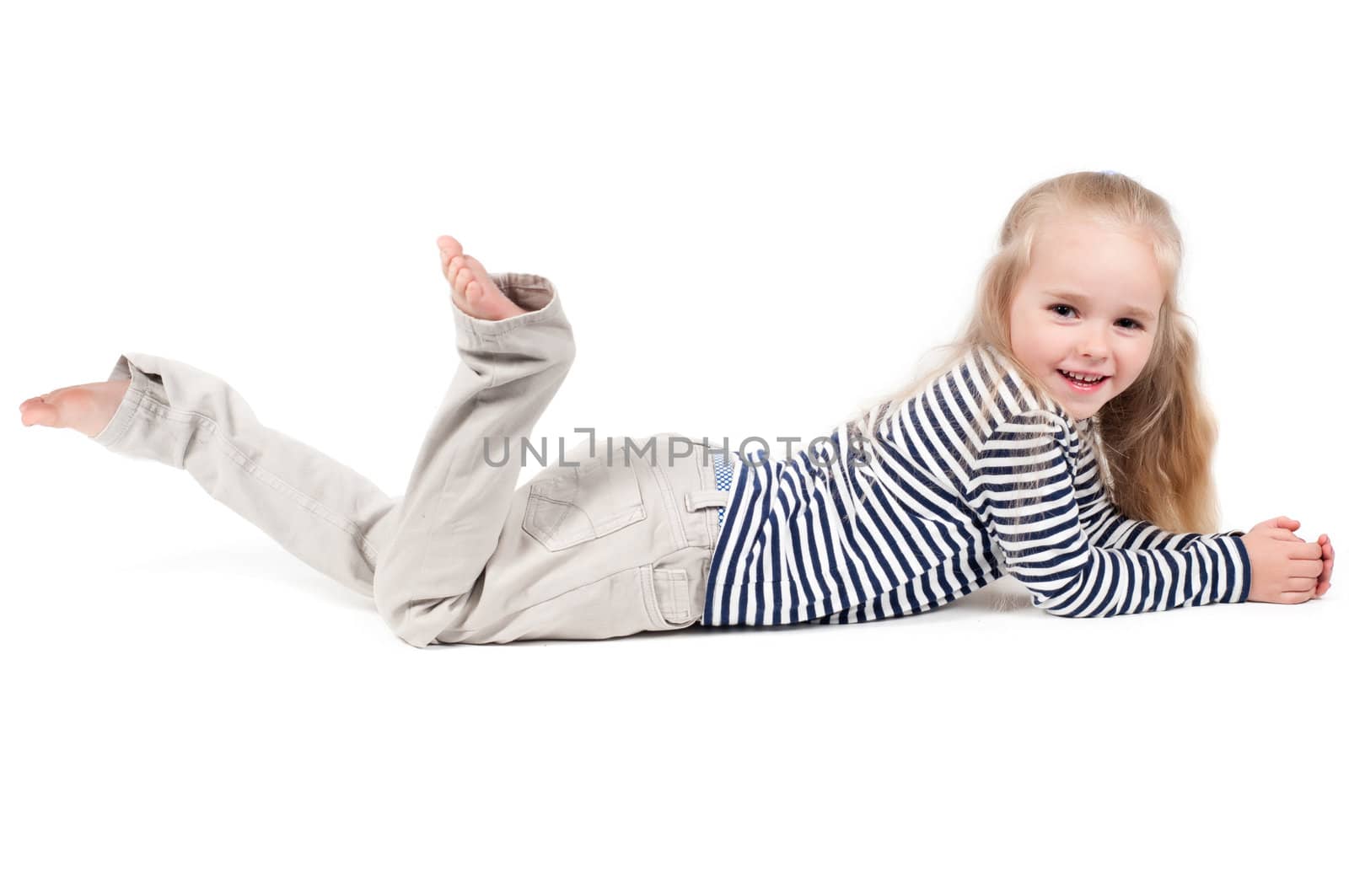 Shot of little cute girl with long hair in studio