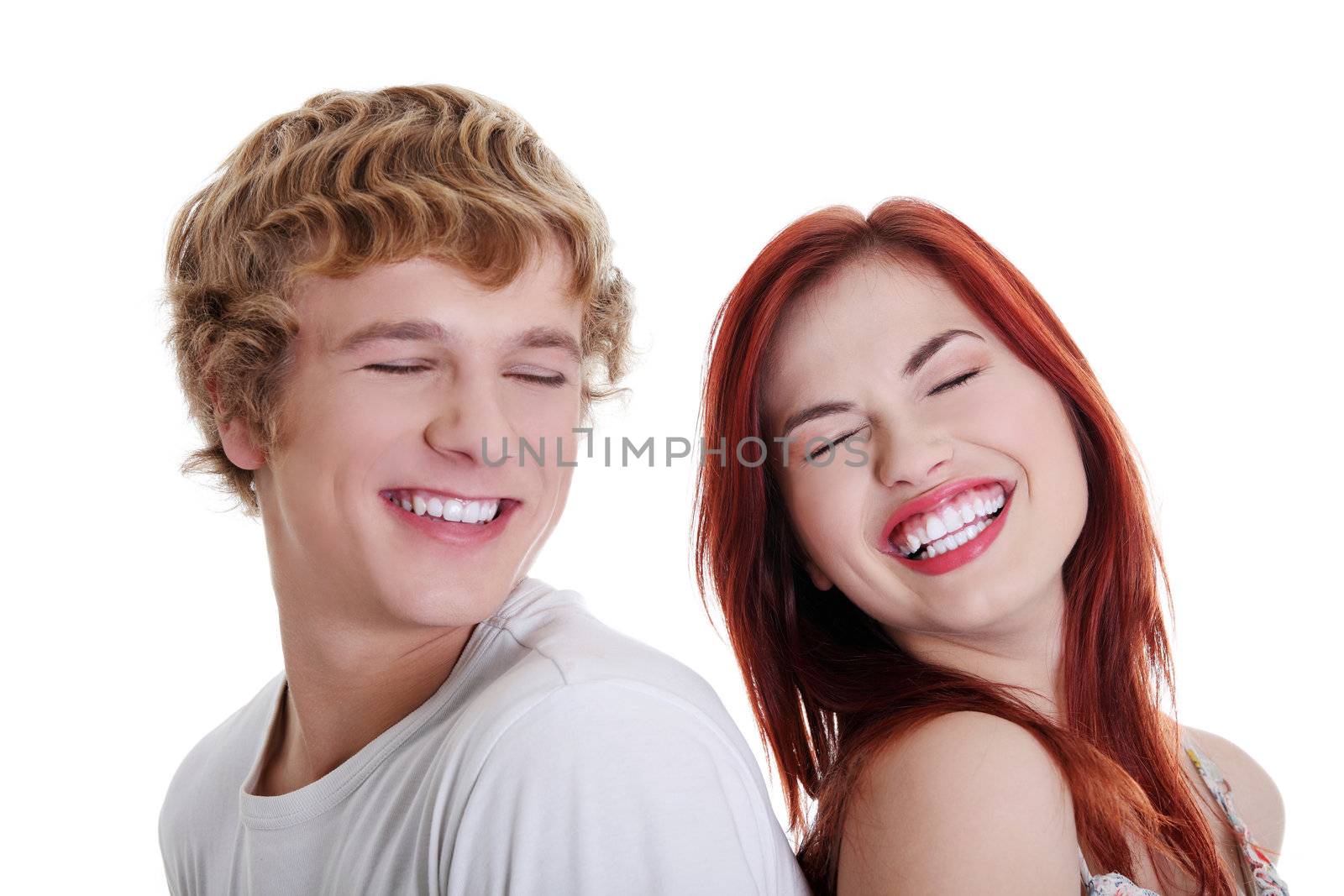 Young caucasian laughing couple. Isolated on white background.