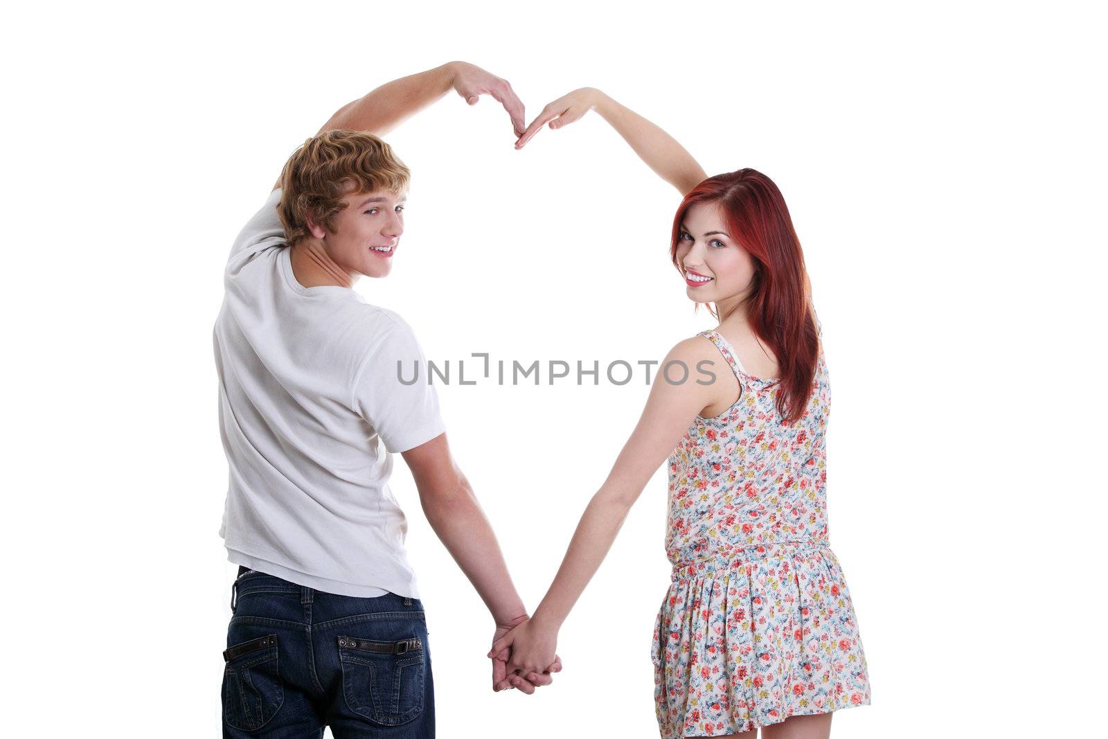 Young couple making heart shape. by BDS