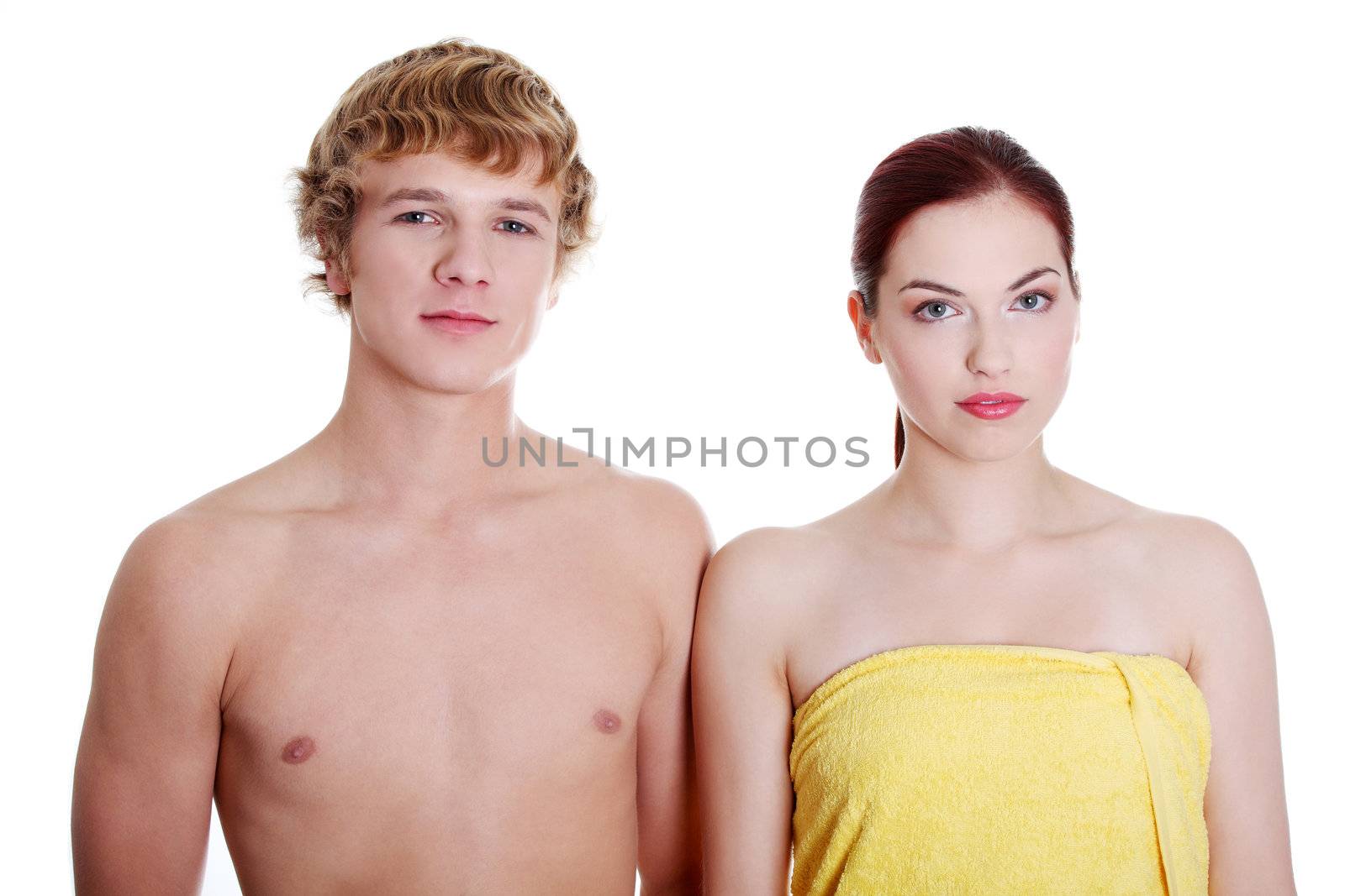 Young caucasian couple ready to spa therapy. Isolated on white background.