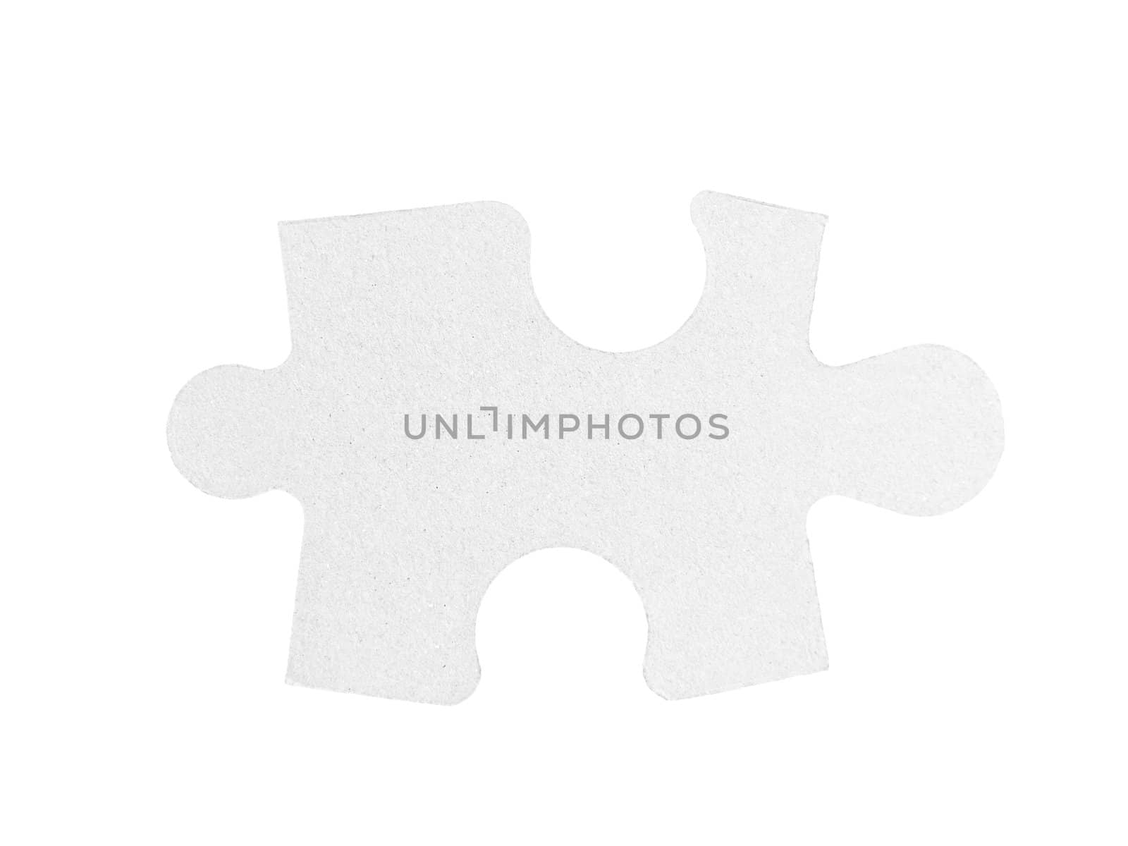 Piece of a jigsaw puzzle isolated on white background