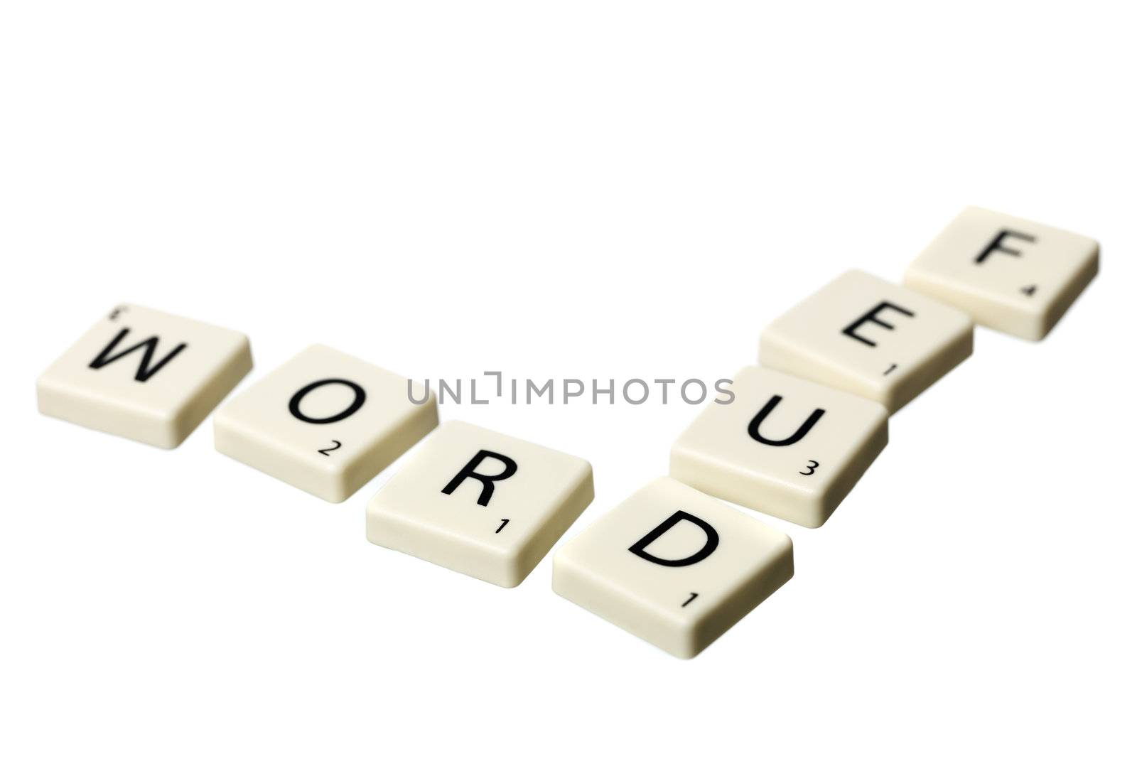 The word wordfeud written with scrabble pieces