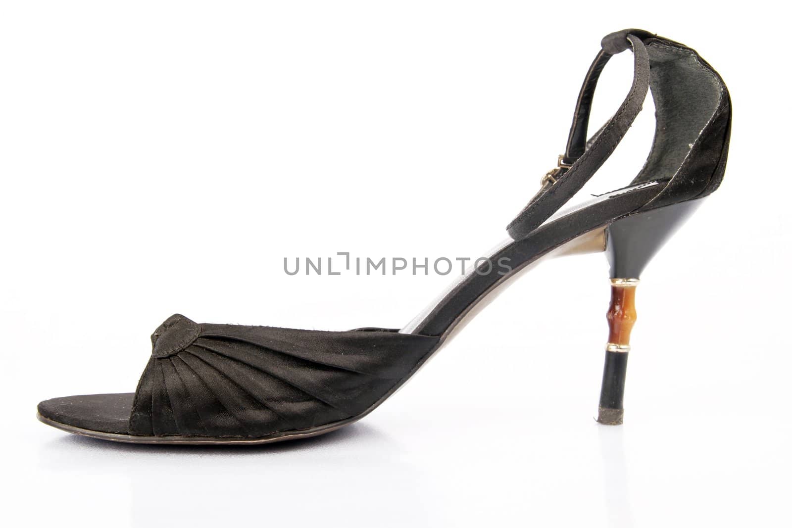 Black high heel women shoes on white background.