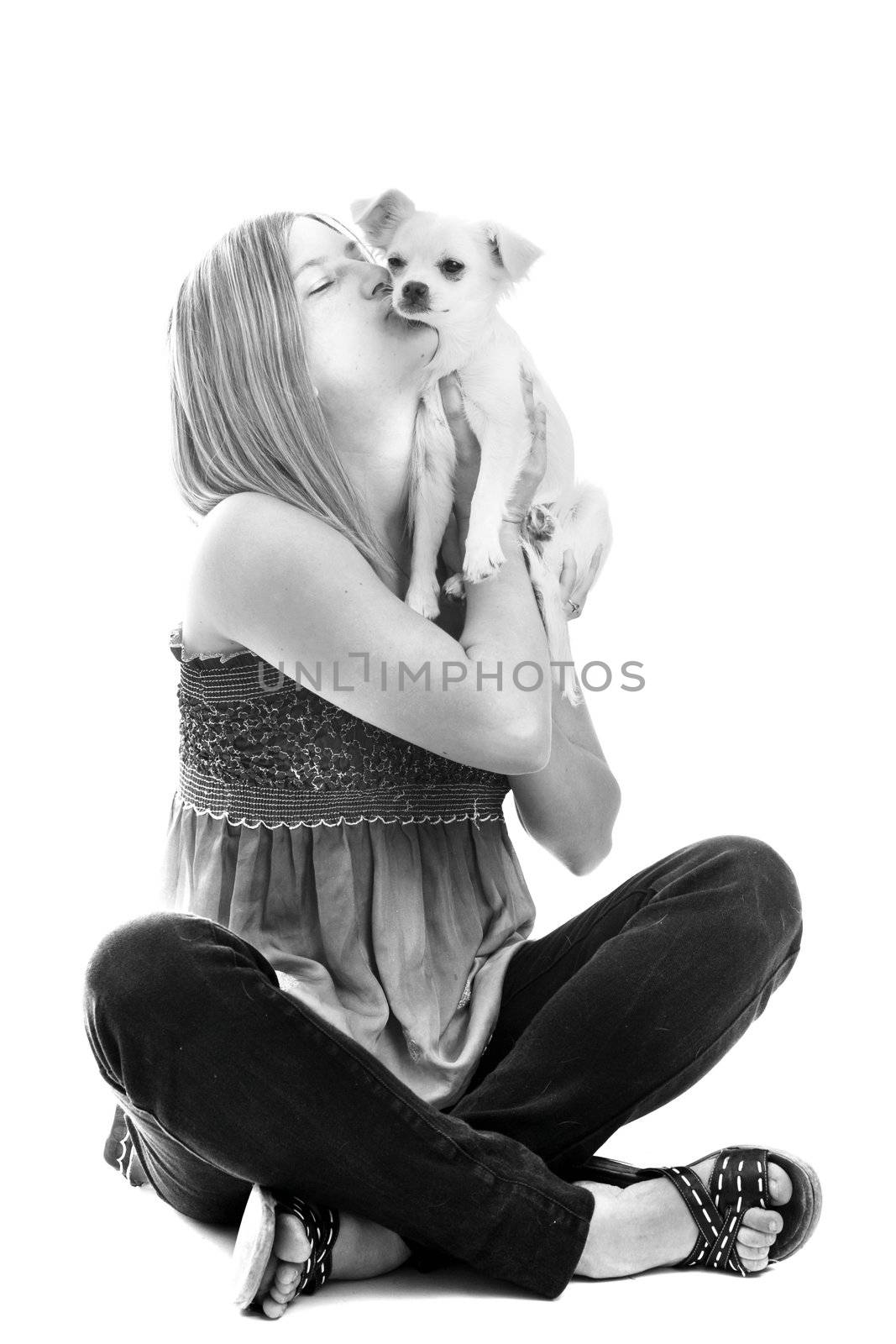 portrait of a woman and puppy chihuahua in front of white background