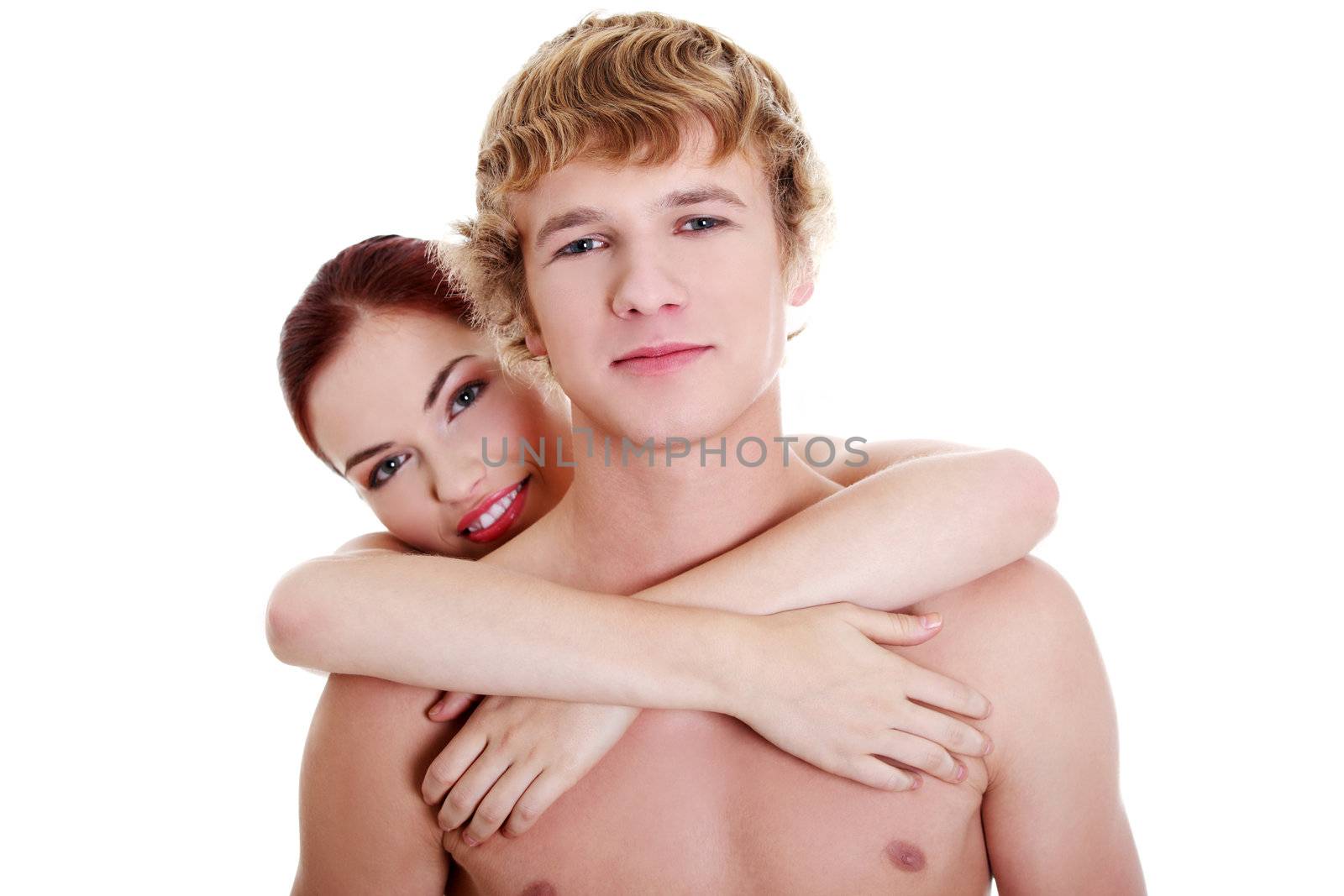 Happy topless couple embracing. by BDS